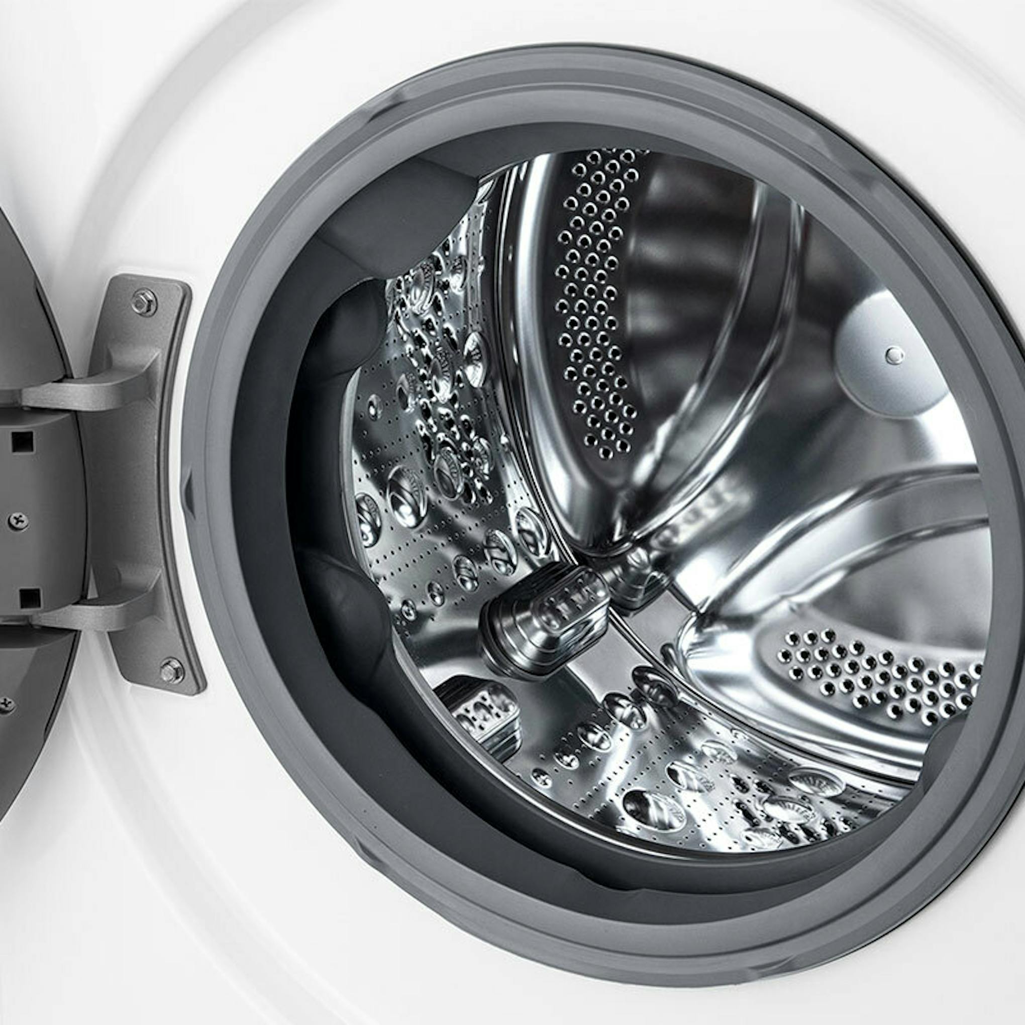 Interior del tambor de la lavadora LG F4WR6013A0W con la puerta abierta