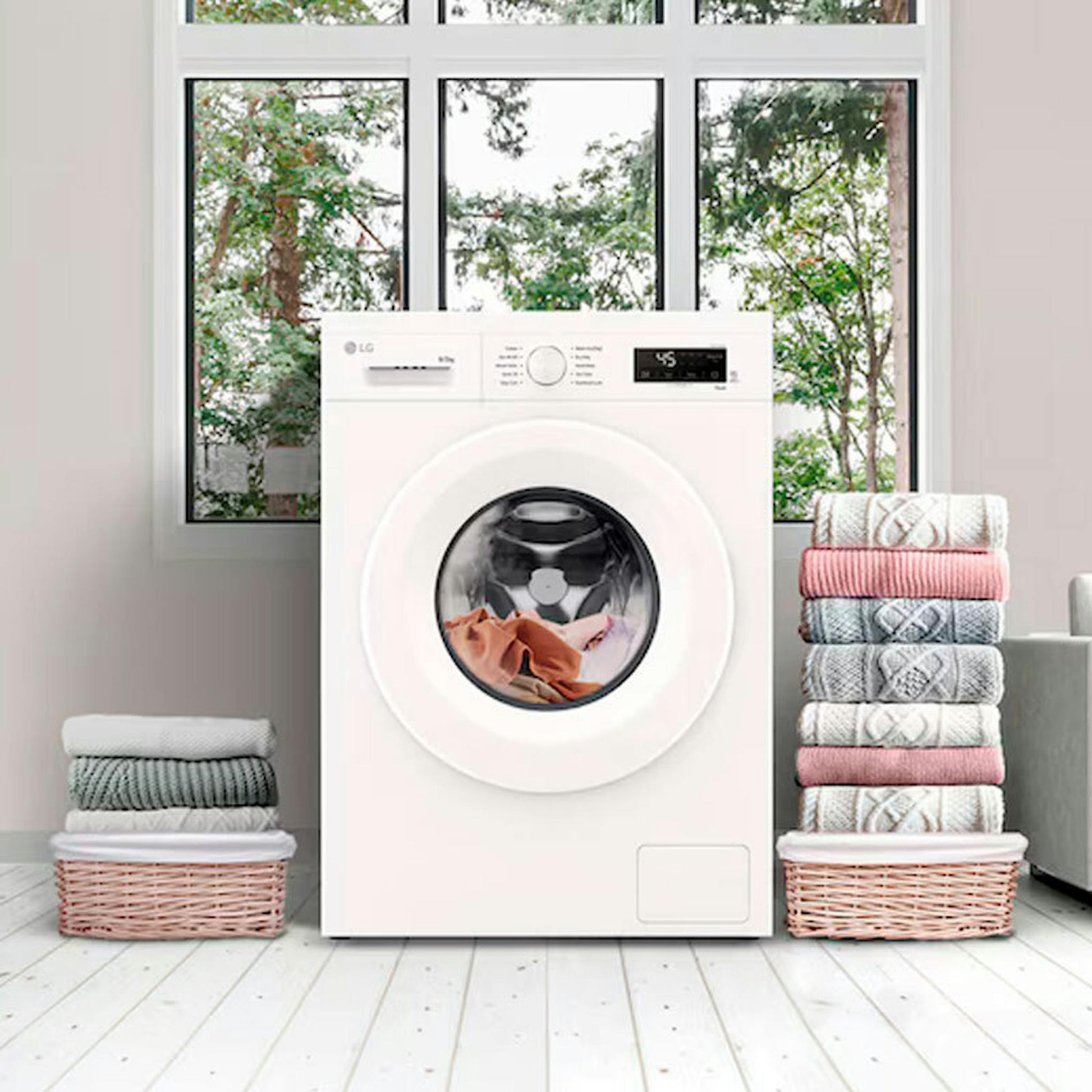 Lavasecadora LG W4X1085NWH blanca frente a una ventana, con ropa en el tambor.