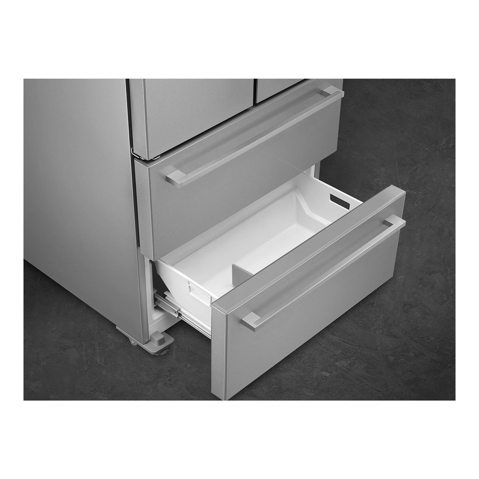 Frigorífico americano Smeg FQ55FXDE en inox, vista frontal parcial con dos cajones inferiores abiertos.