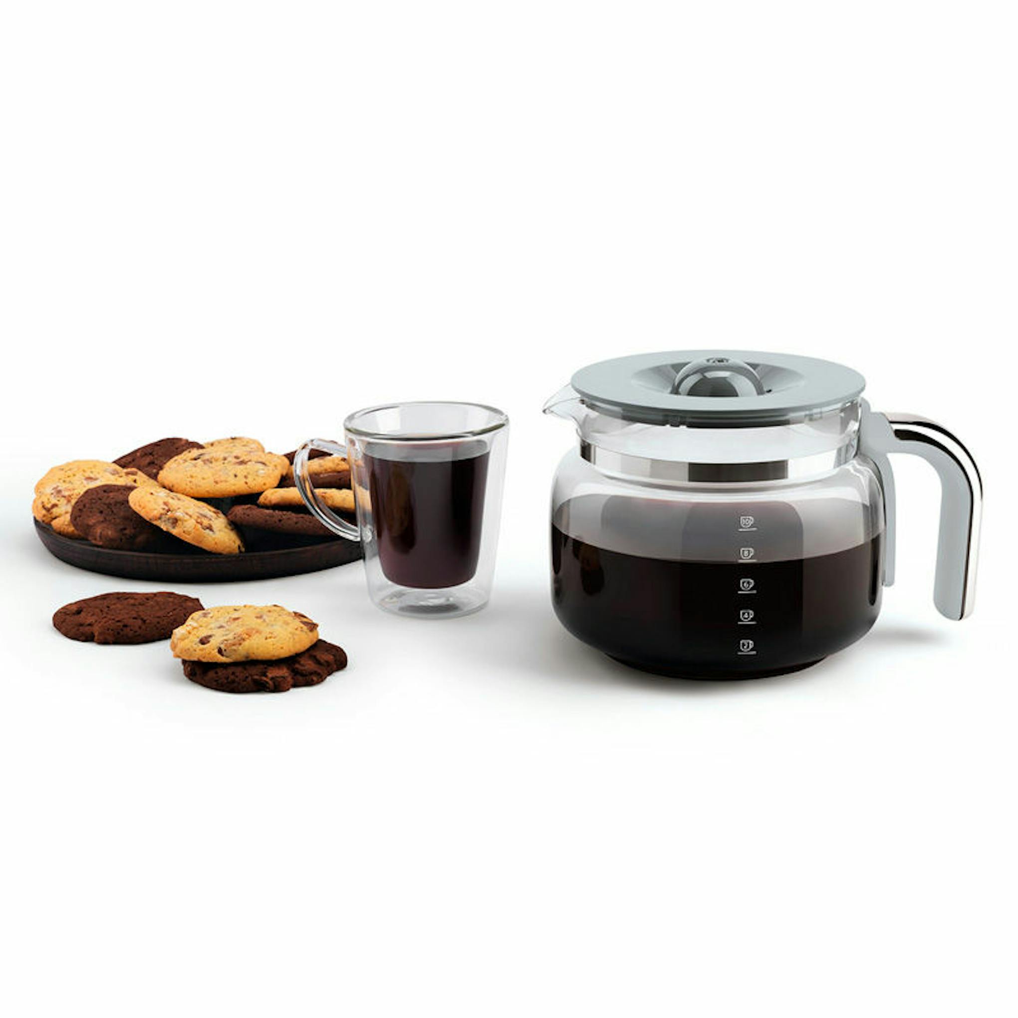 Cafetera de goteo Smeg DCF02PGEU verde pastel con taza de café y galletas