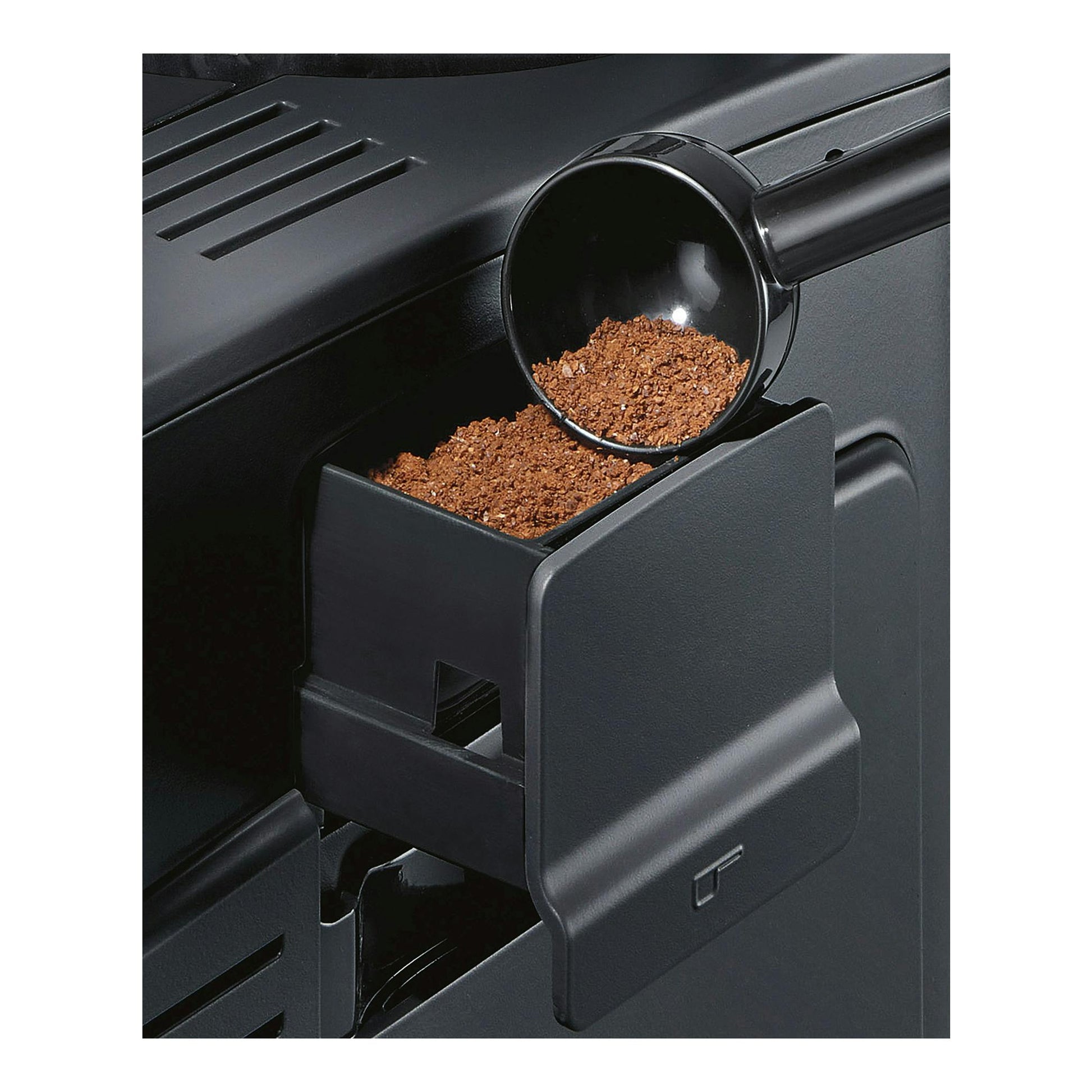 Cafetera superautomática Siemens TE655203RW negra, vista en primer plano del depósito con café molido.