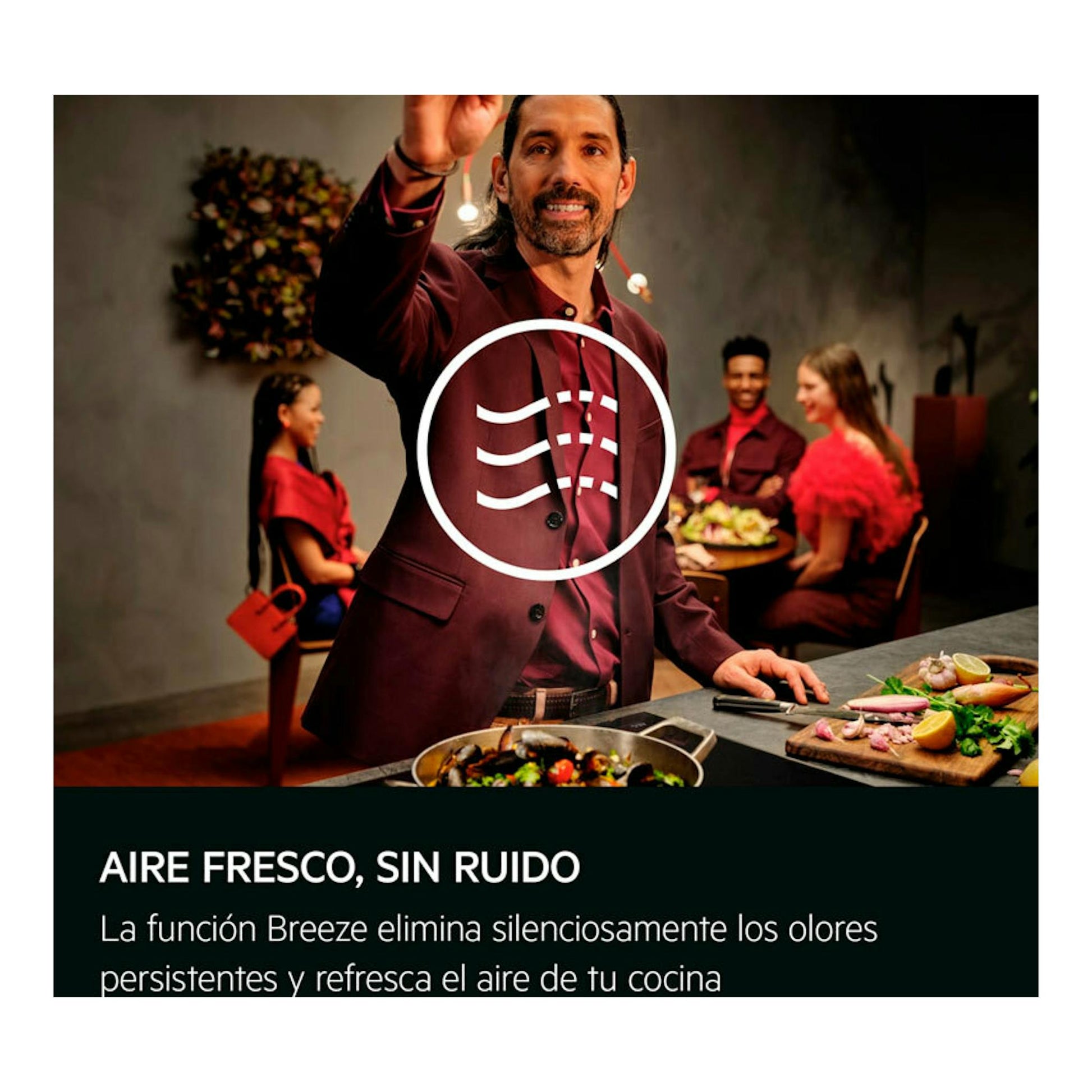 Anuncio de AEG GV77D61SB: chef cocinando en una cocina, con icono de aire y texto “AIRE FRESCO, SIN RUIDO”.