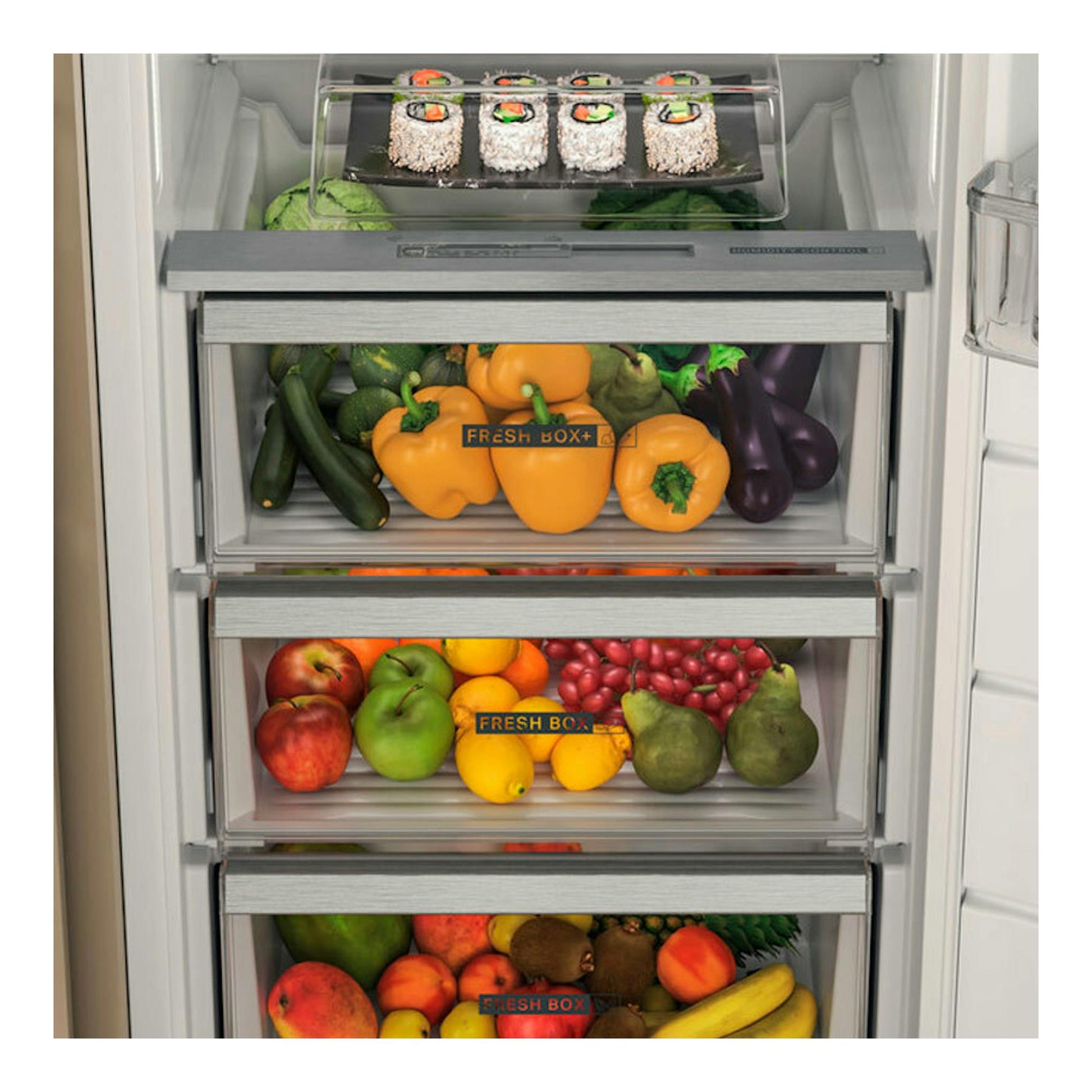 Interior de frigorífico Whirlpool WHSD18A013C1 con cajones transparentes llenos de frutas y verduras, vista frontal.