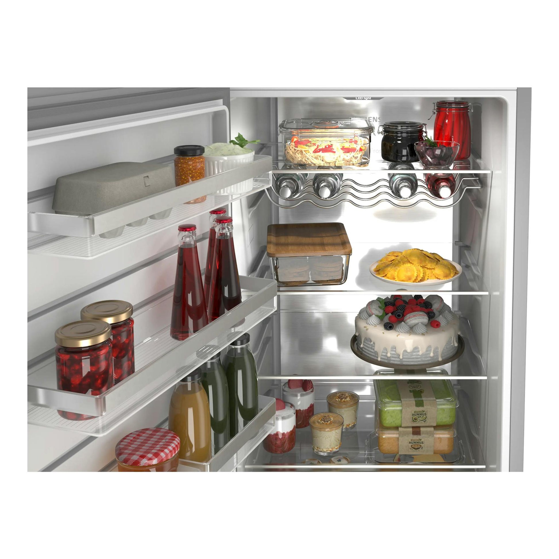 Interior de frigorífico Siemens KS36NVICG en inox, vista frontal abierta con estantes y alimentos.