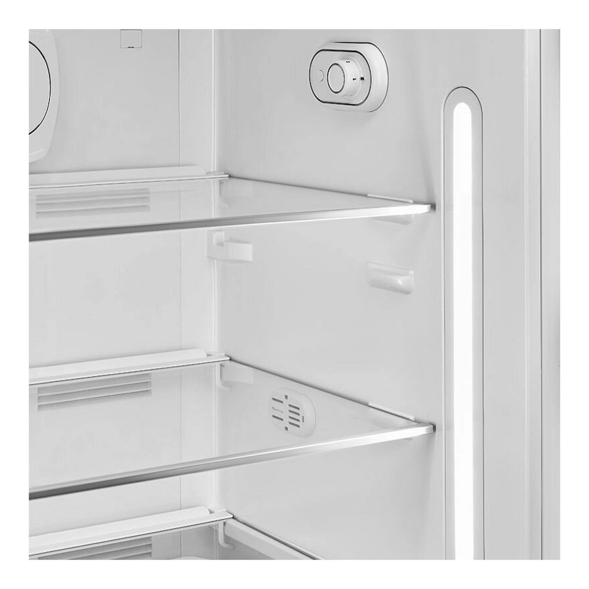 Interior de frigorífico Smeg FAB28ROR6 blanco, con estantes de cristal, luz lateral y control.