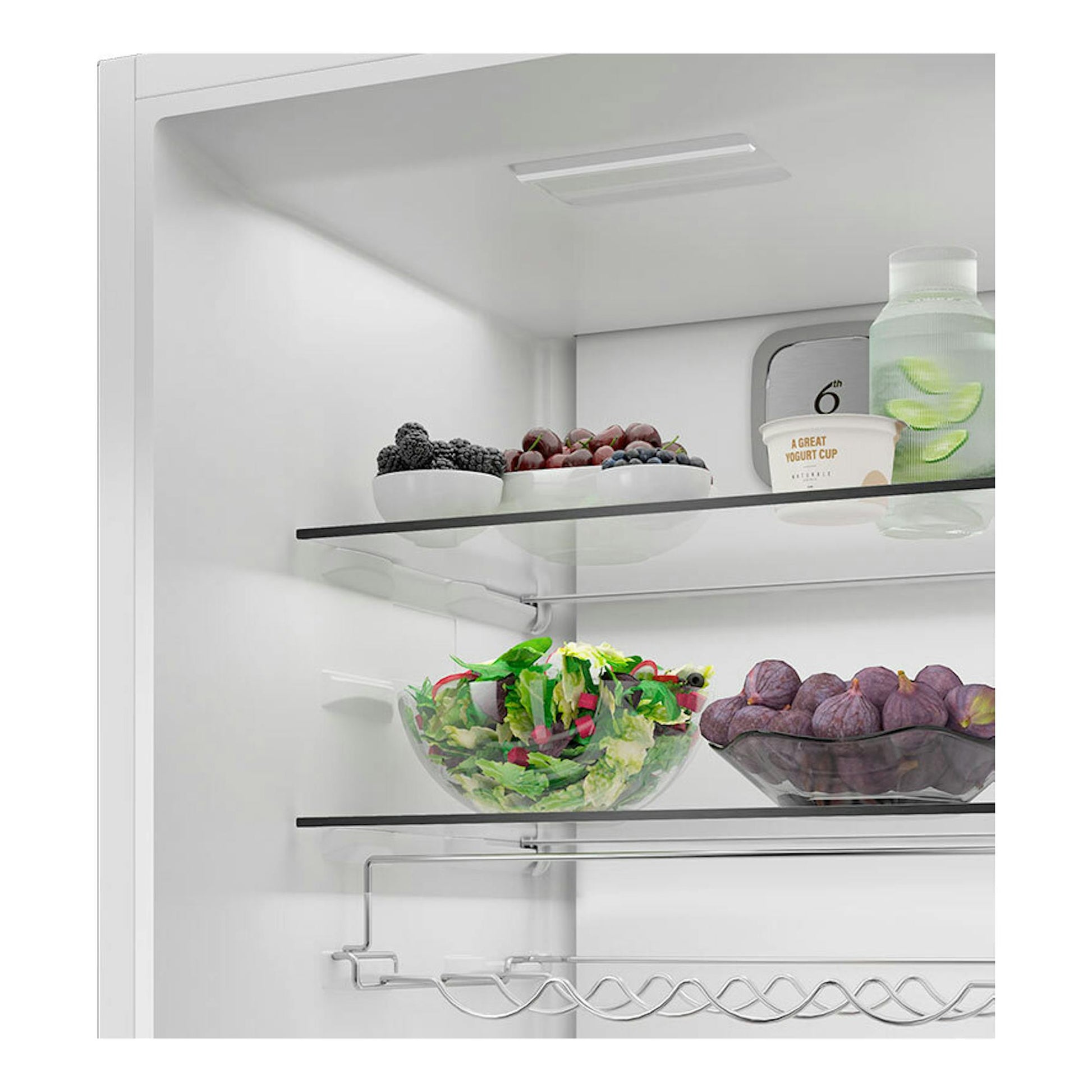 Frigorífico Whirlpool WHMLF 6442 W4E blanco, interior con estantes de cristal, frutas, ensalada y botellas.