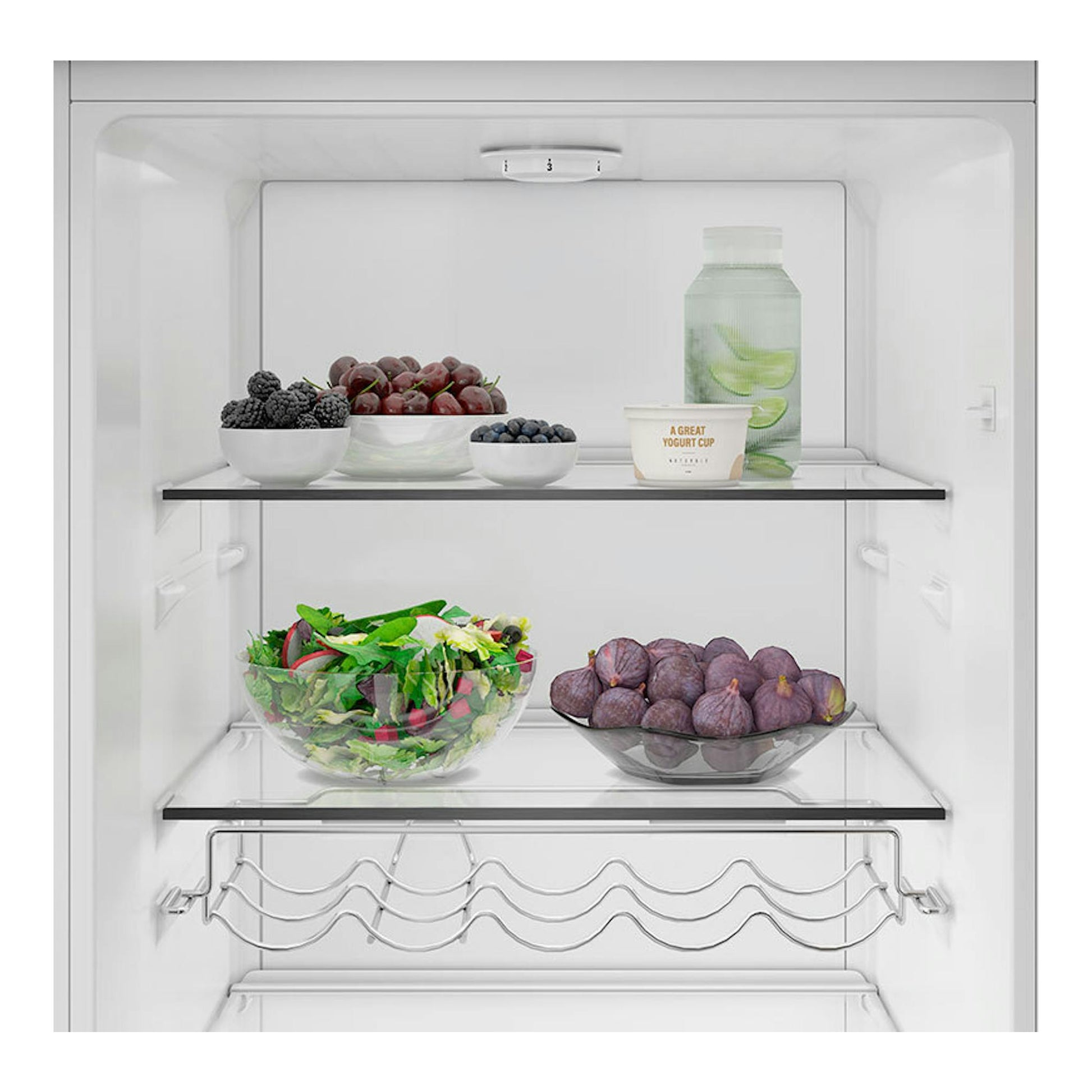 Vista frontal del interior de un frigorífico blanco Whirlpool WHMLS 2411 W4E con fruta y cuencos.