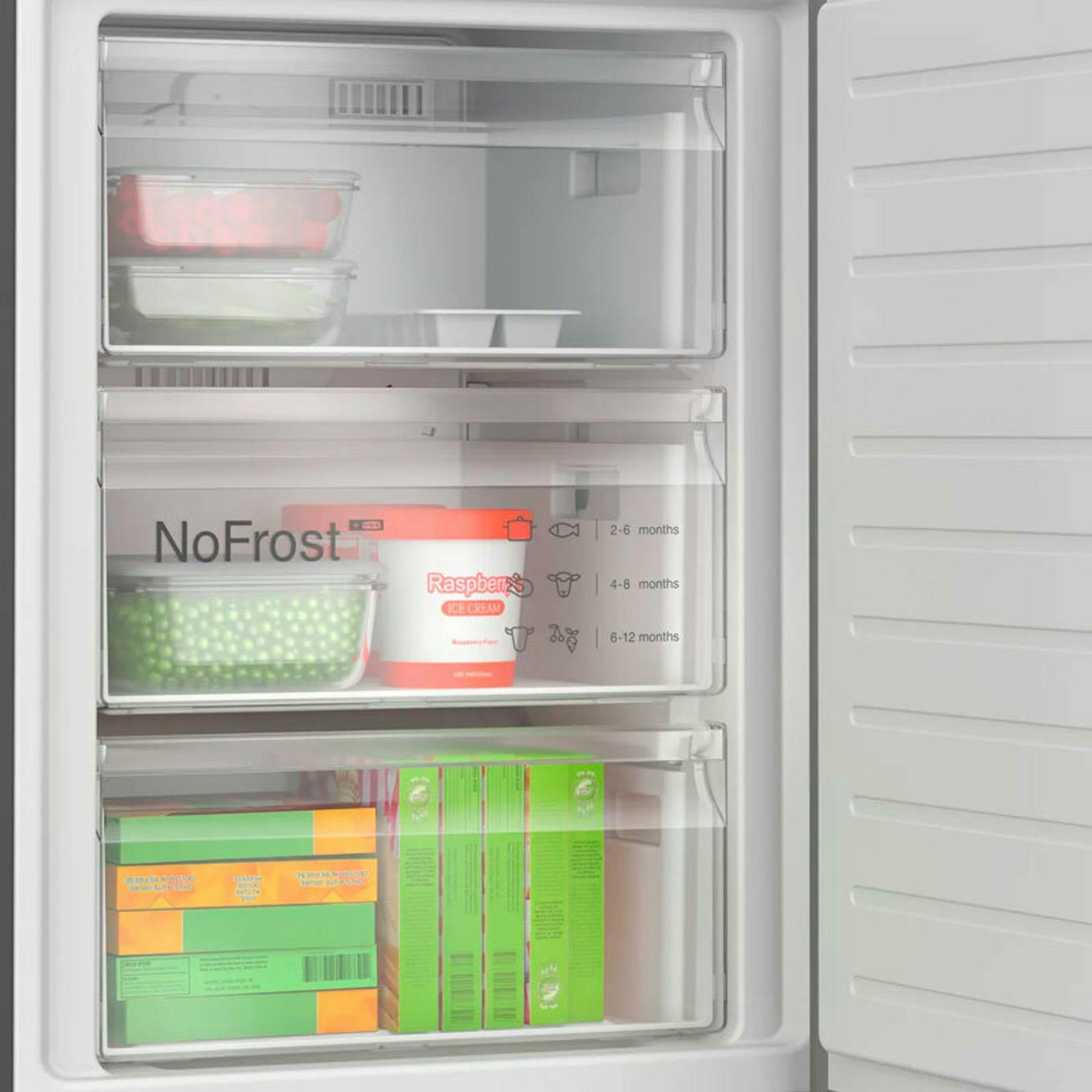Bosch KGN392XCF interior del congelador con cajones y alimentos