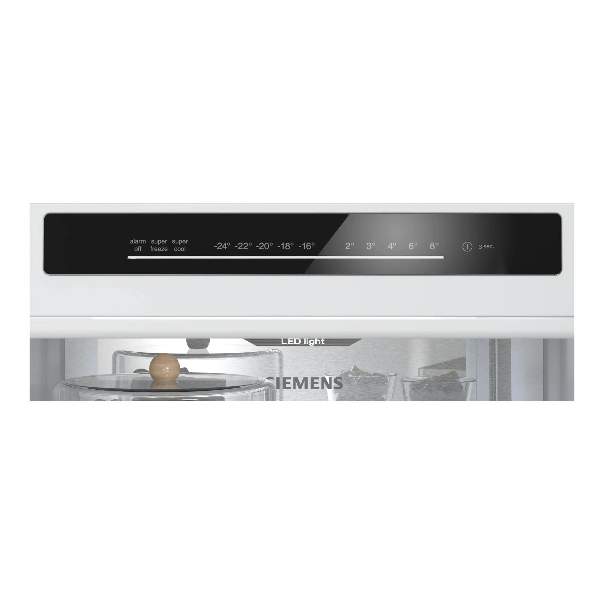 Frigorífico combi Siemens KG36NVIDG en inox, con panel táctil negro y vista parcial del interior iluminado.