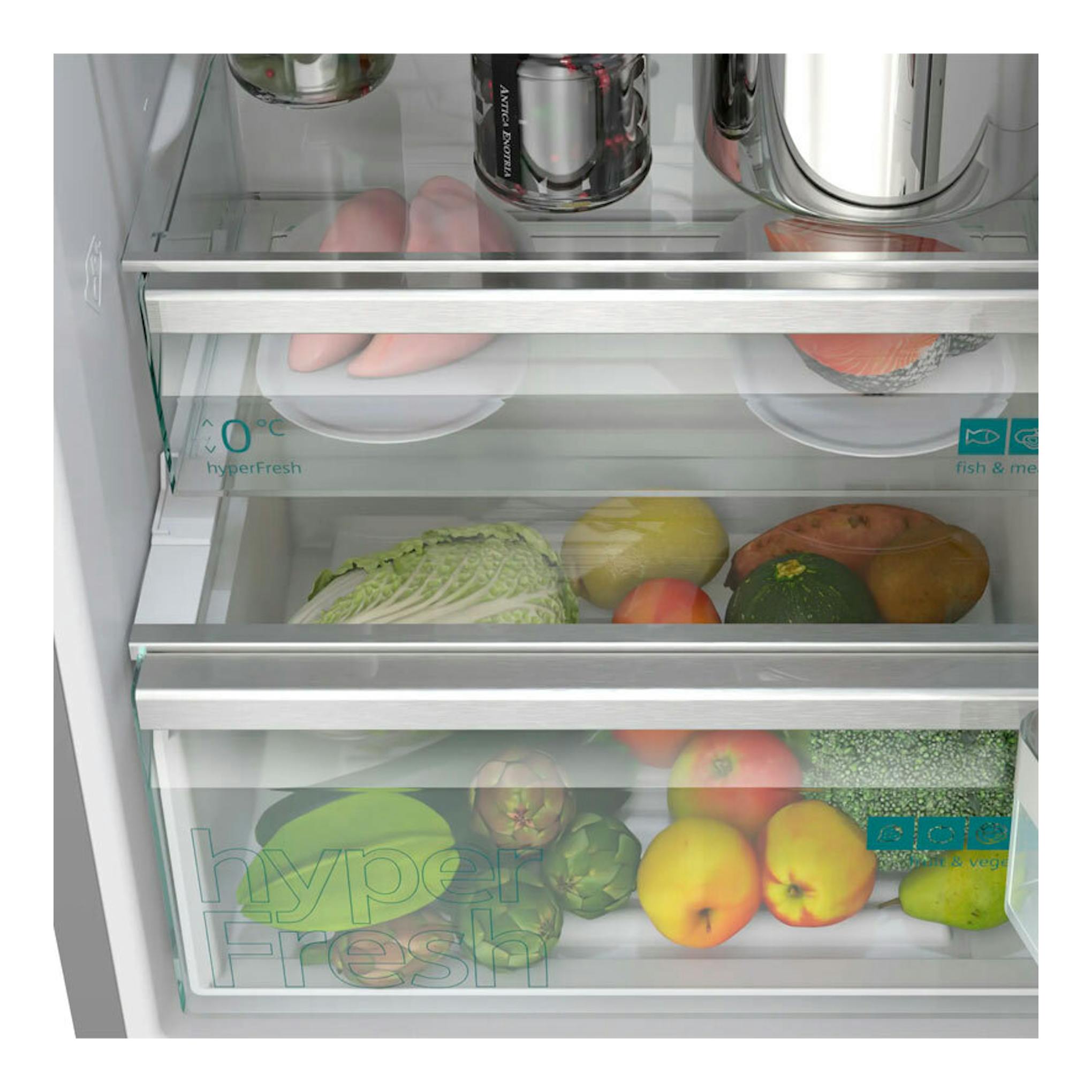 Frigorífico combi Siemens KG39NVICV inox, vista interior de cajones transparentes con frutas y verduras.
