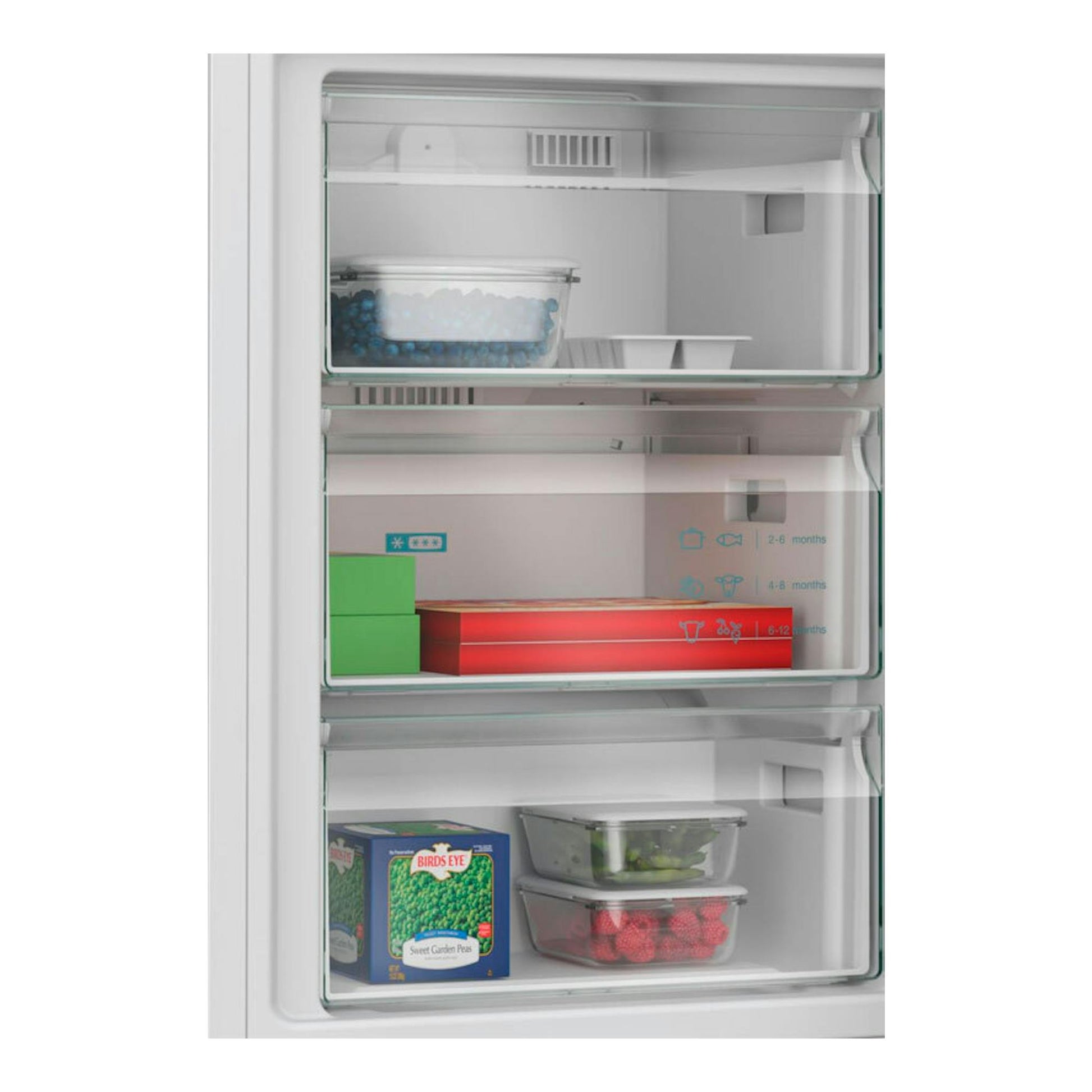 Frigorífico combi Siemens KG39NVWDG blanco, interior del congelador en vista frontal con cajones y alimentos.