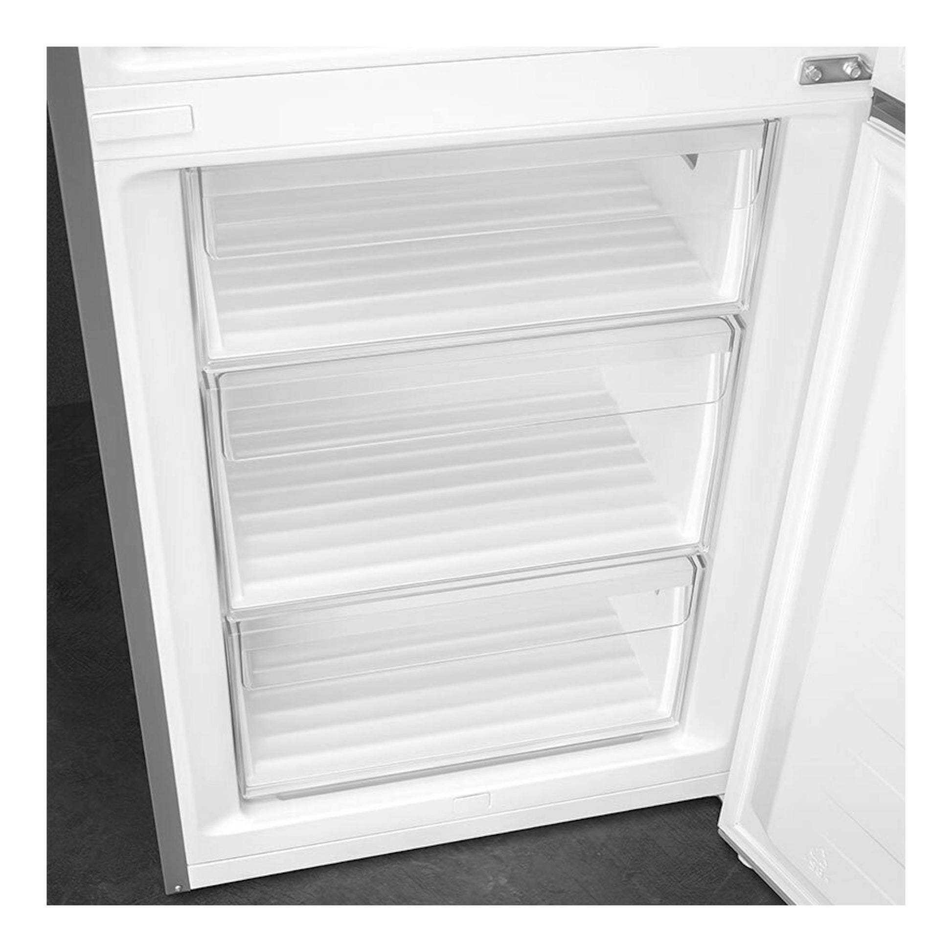 Frigorífico combi Smeg RC20XDNE blanco, interior con tres cajones transparentes del congelador, vista frontal.