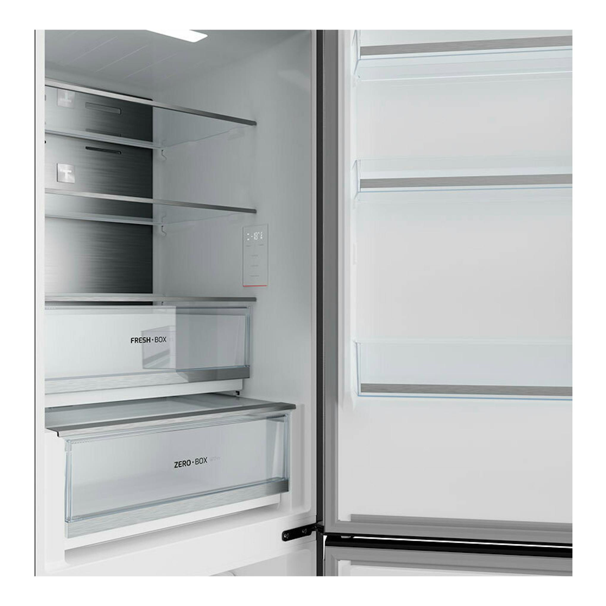 Frigorífico combi Teka RBF64660 Inox abierto, interior blanco con estantes de vidrio y cajones Fresh Box y Zero Box.