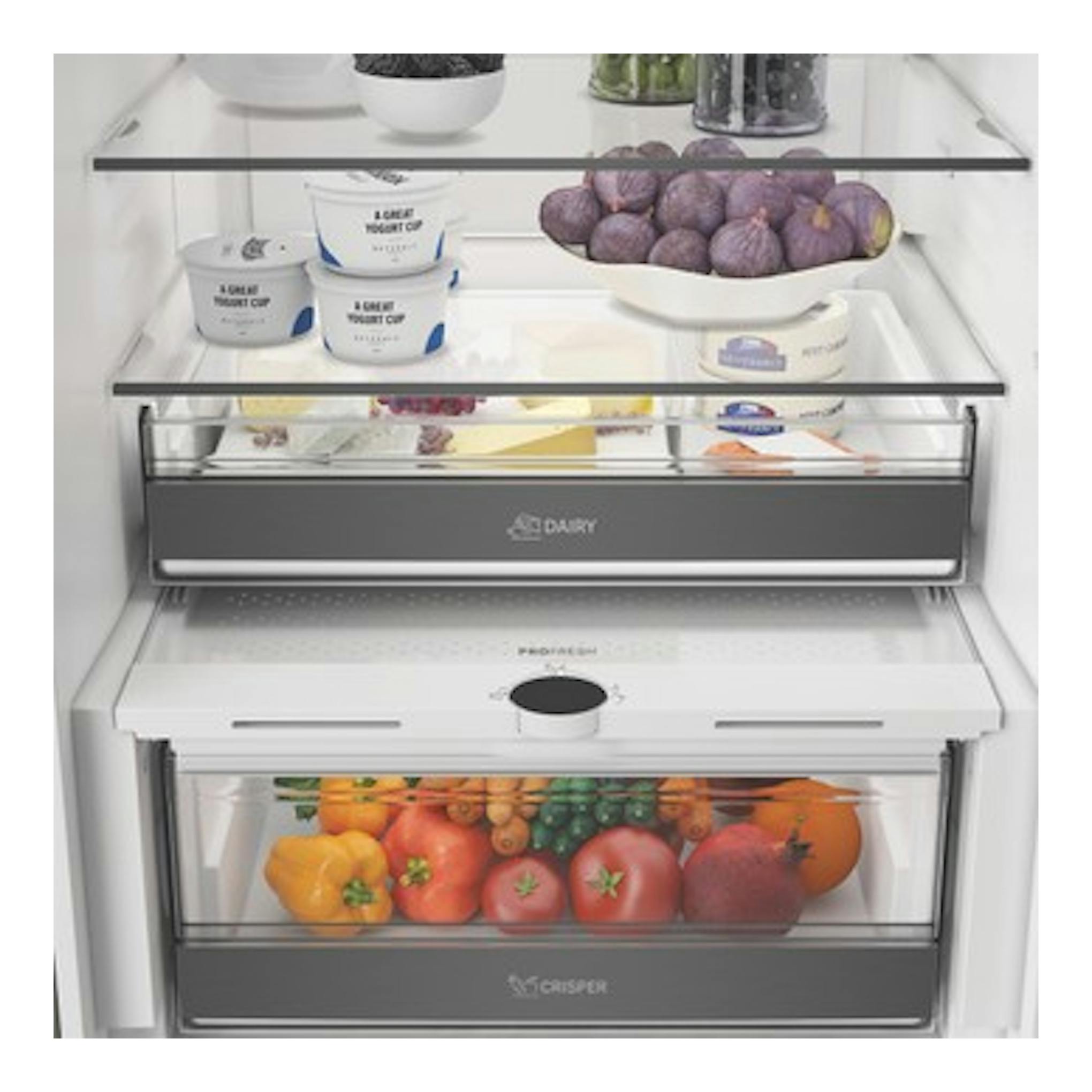 Interior de frigorífico combi Whirlpool WHK 26413 X6EE, con estantes de cristal y cajones con frutas y yogures.