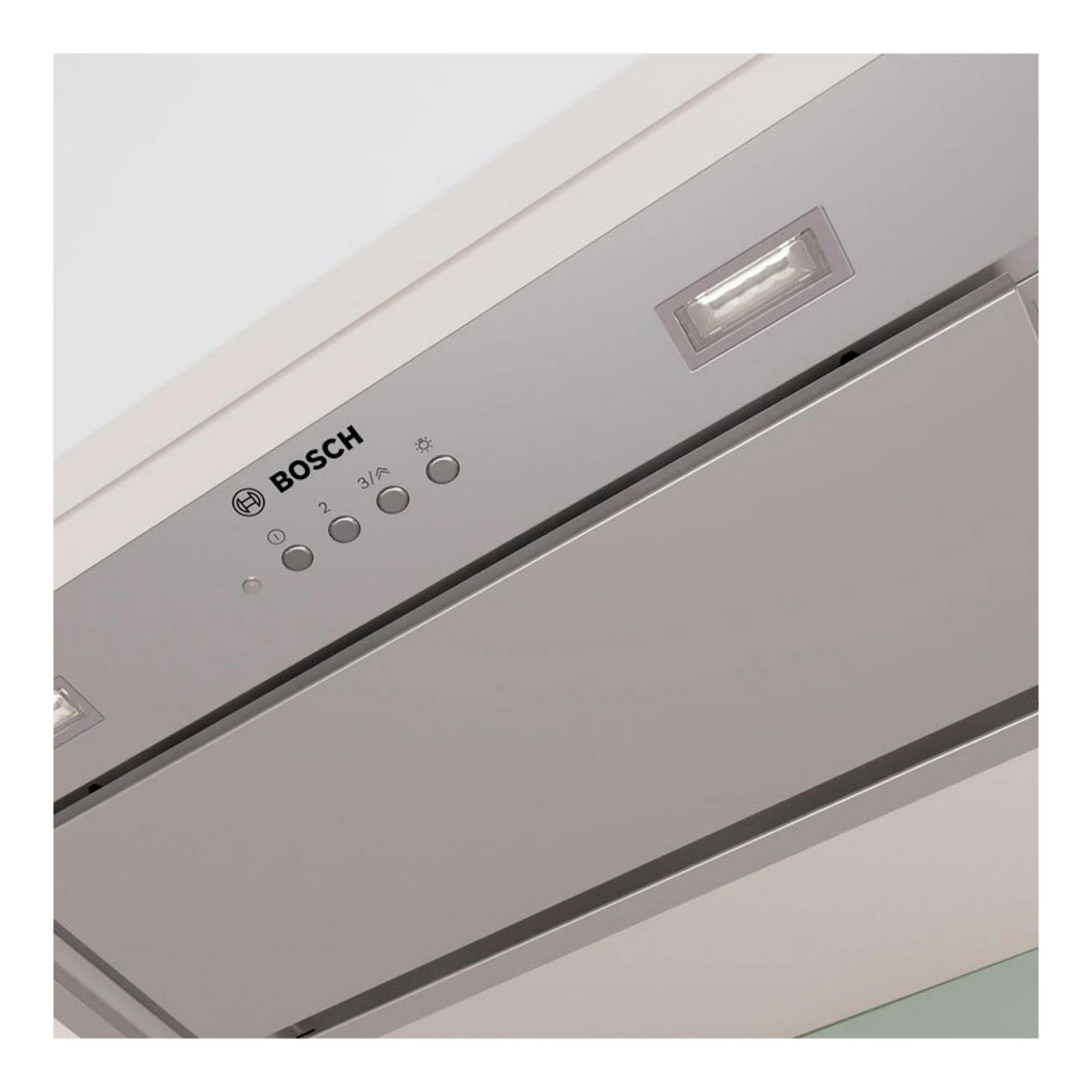 Grupo filtrante Bosch DLN56AC50 de acero inoxidable, vista inferior inclinada con luces y panel de botones.