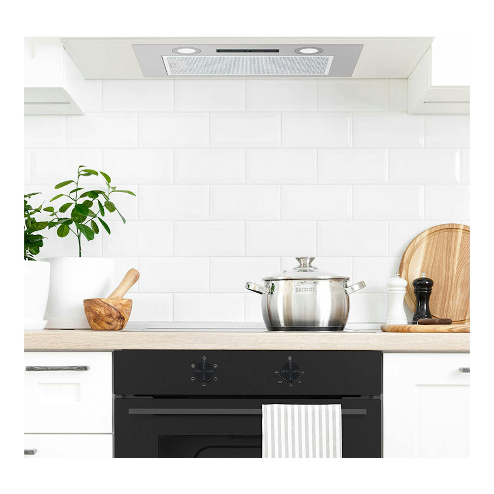 Grupo filtrante Cata GKA5200X inox, vista inferior bajo mueble de cocina.