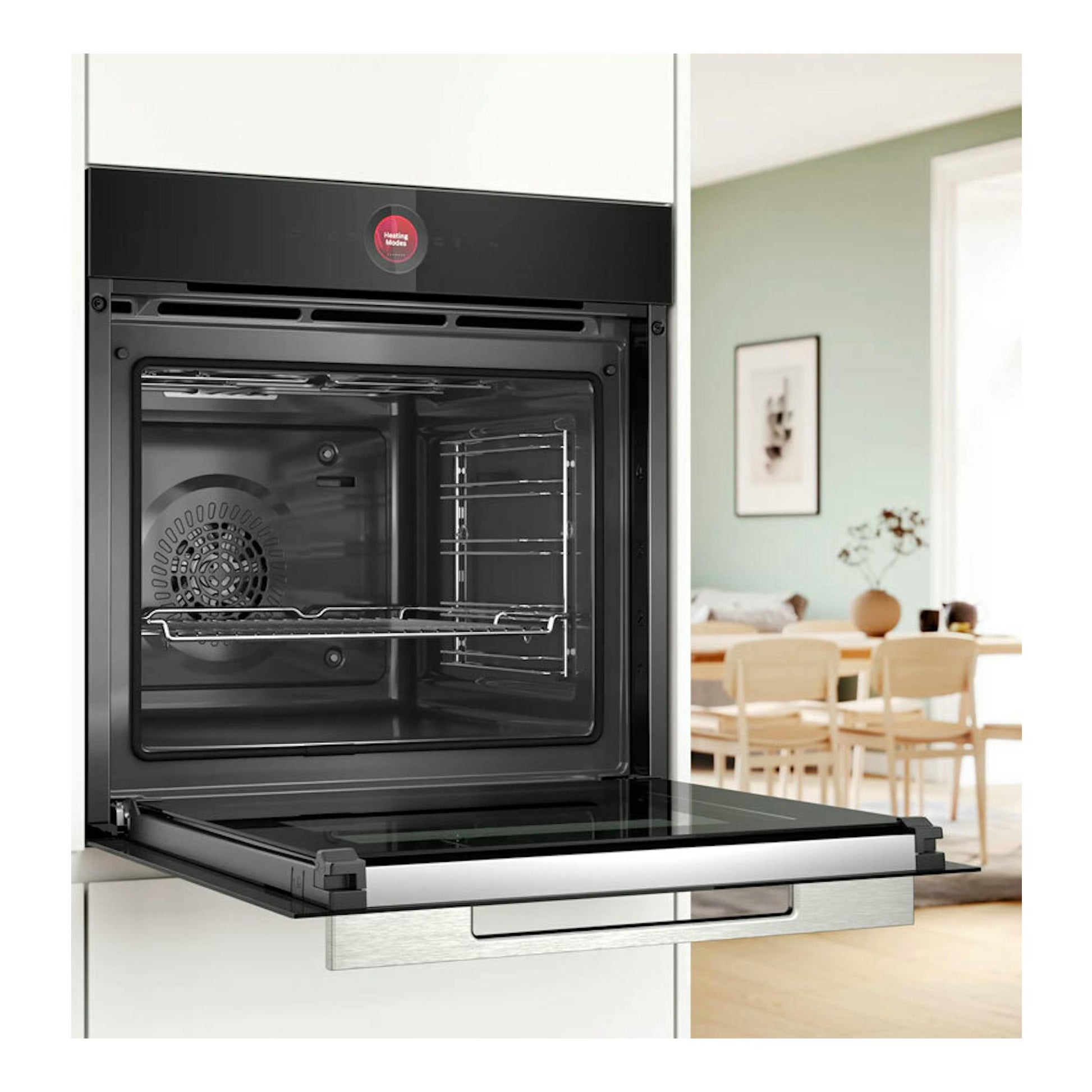 Horno Bosch HBG7741B1 negro, empotrado, con la puerta abatible abierta y el interior visible de frente.