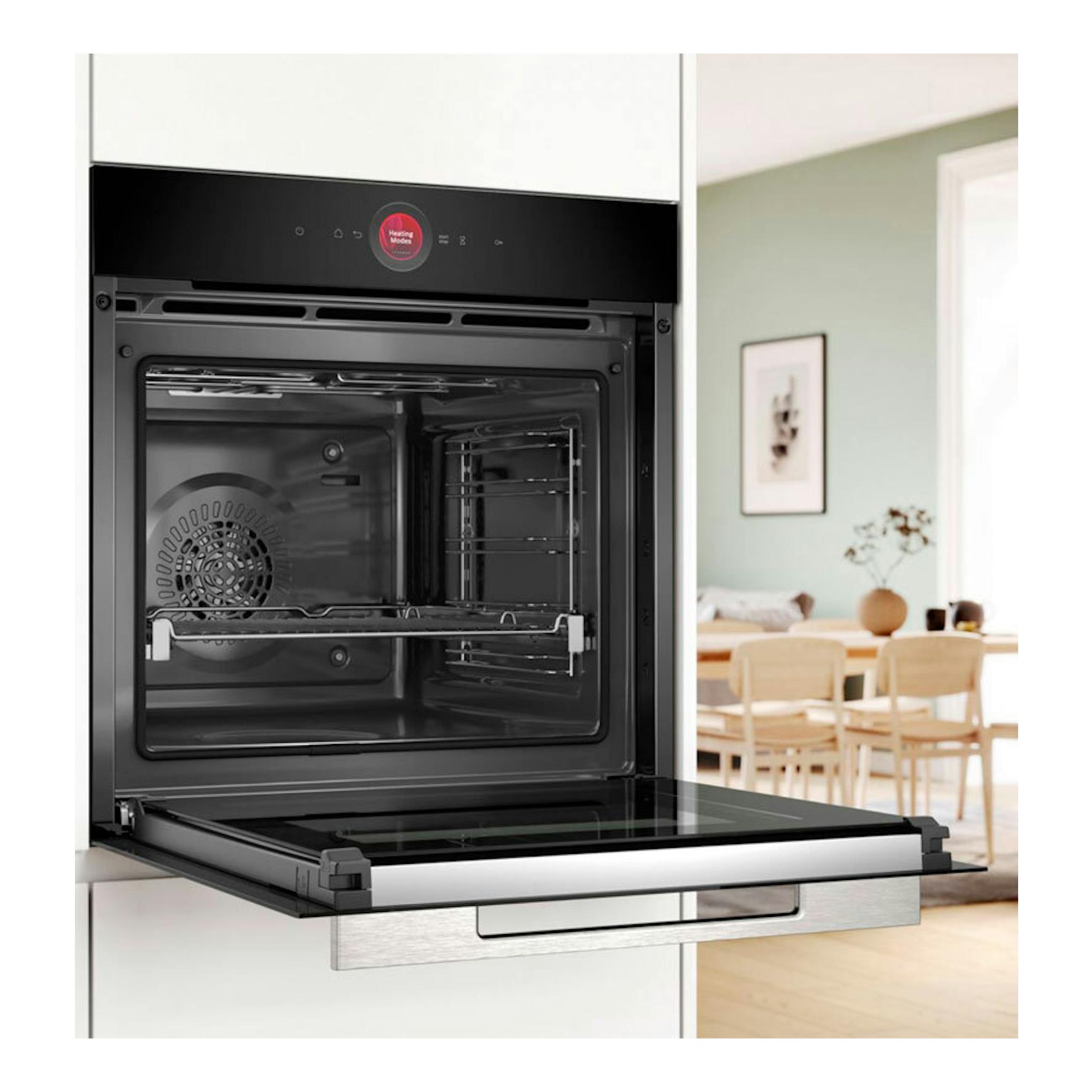 Horno Bosch HBG774KB1 negro, empotrado, con la puerta abatible abierta en vista frontal.