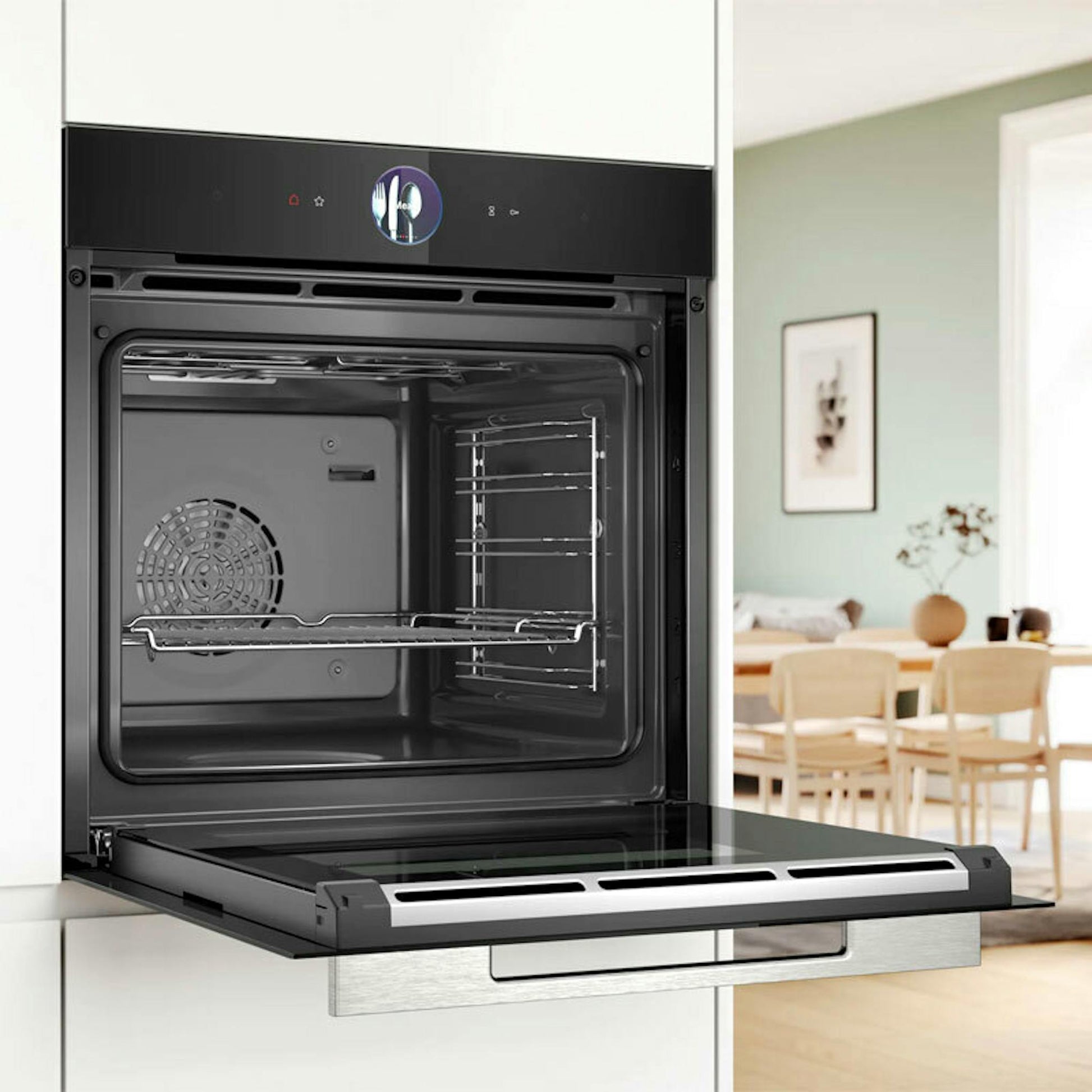 Horno Bosch HSG7361B1 negro con la puerta abierta e interior visible