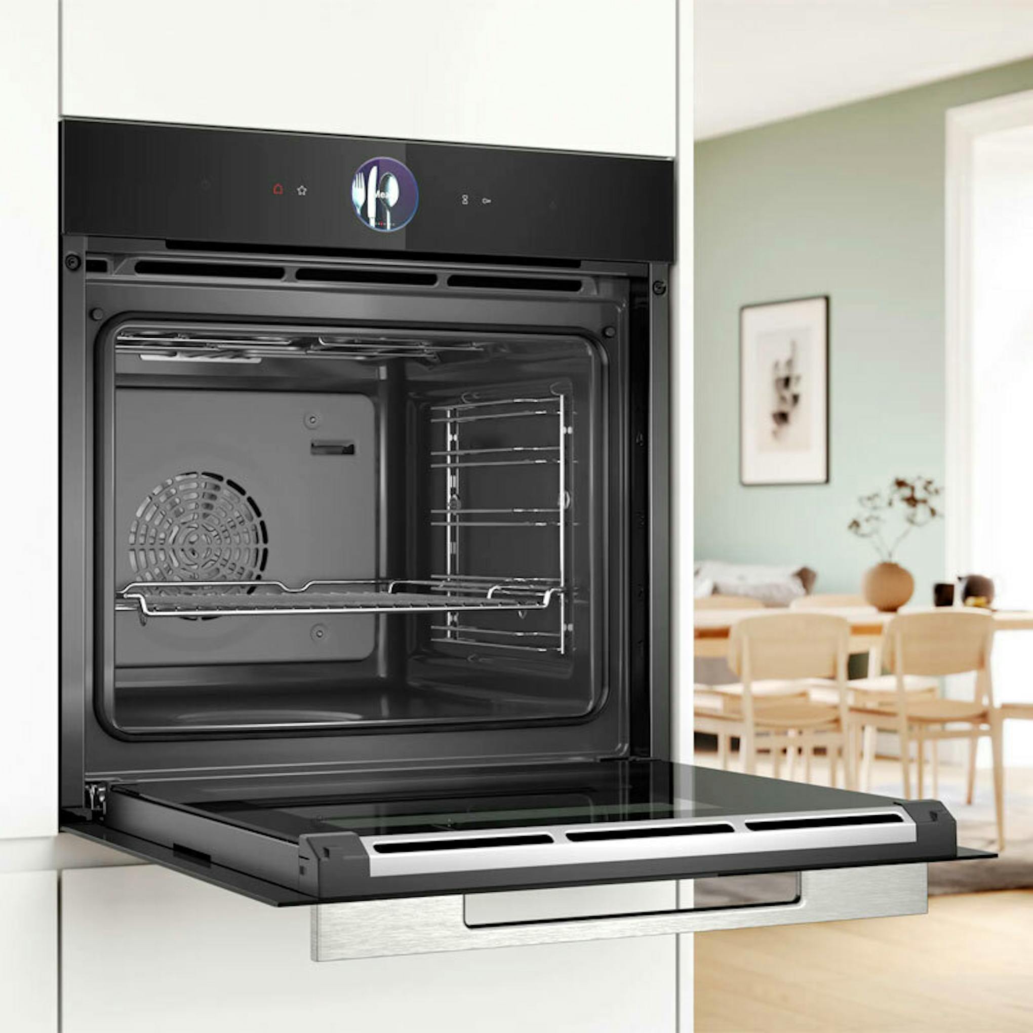 Horno Bosch HSG7361B1 negro con la puerta abierta e interior visible