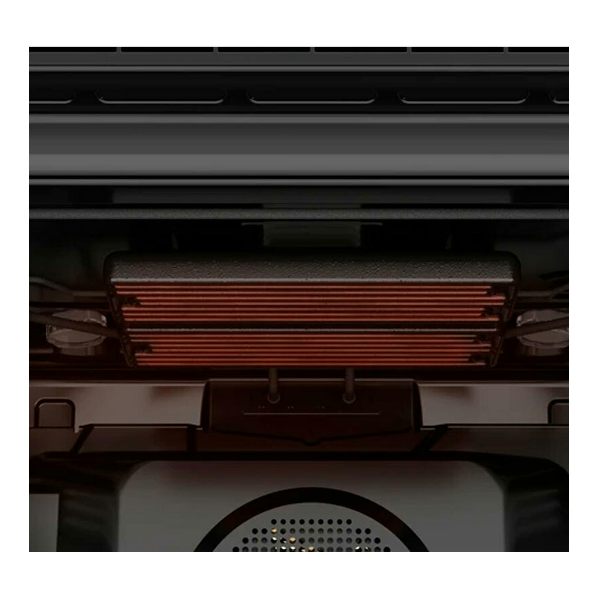 Vista interior frontal de horno integrable STEAKMASTER en cristal negro, con grill y resistencia visible.