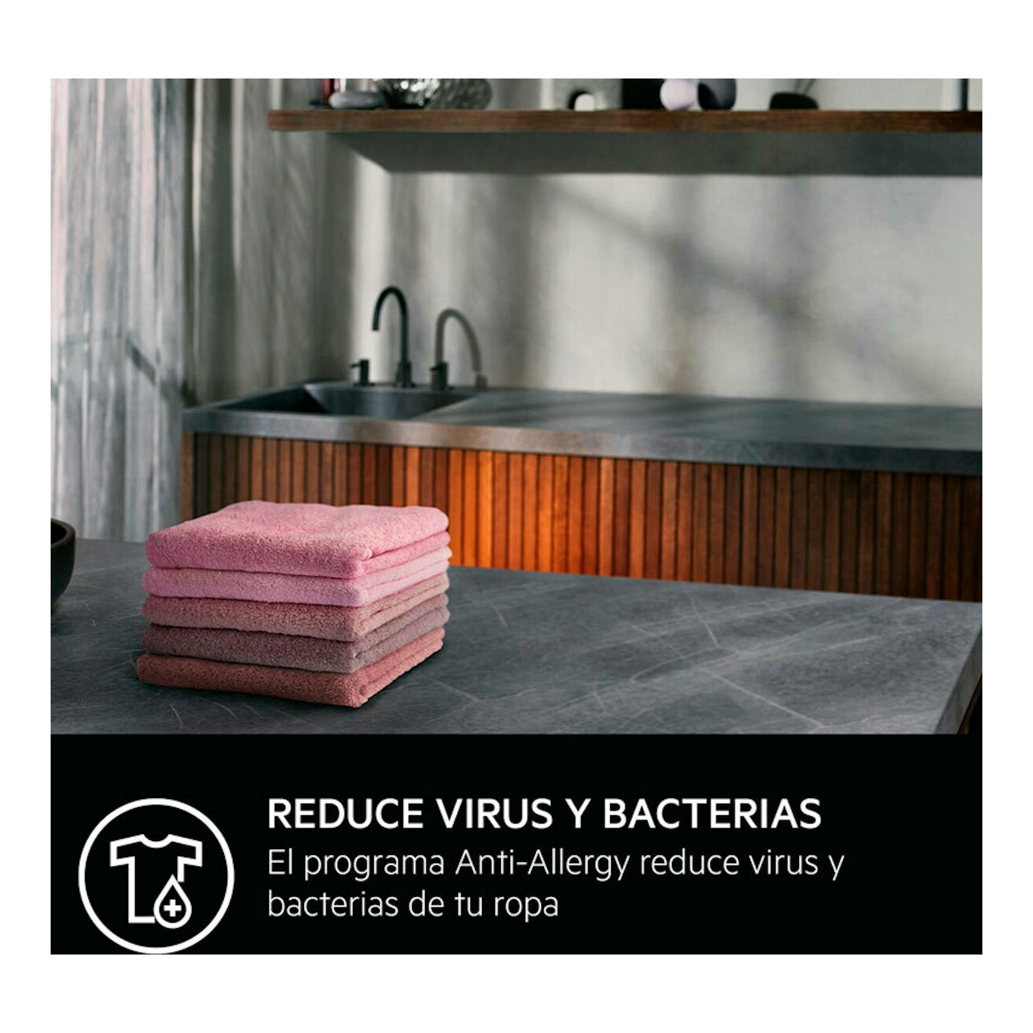 AEG LFR6214O2B: toallas apiladas en una cocina y aviso de reducción de virus y bacterias.