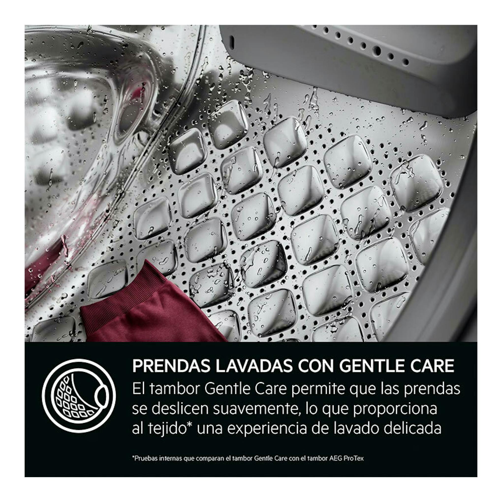 Lavadora AEG LFR7304L4B: primer plano del tambor con gotas de agua y una prenda roja, vista interior.