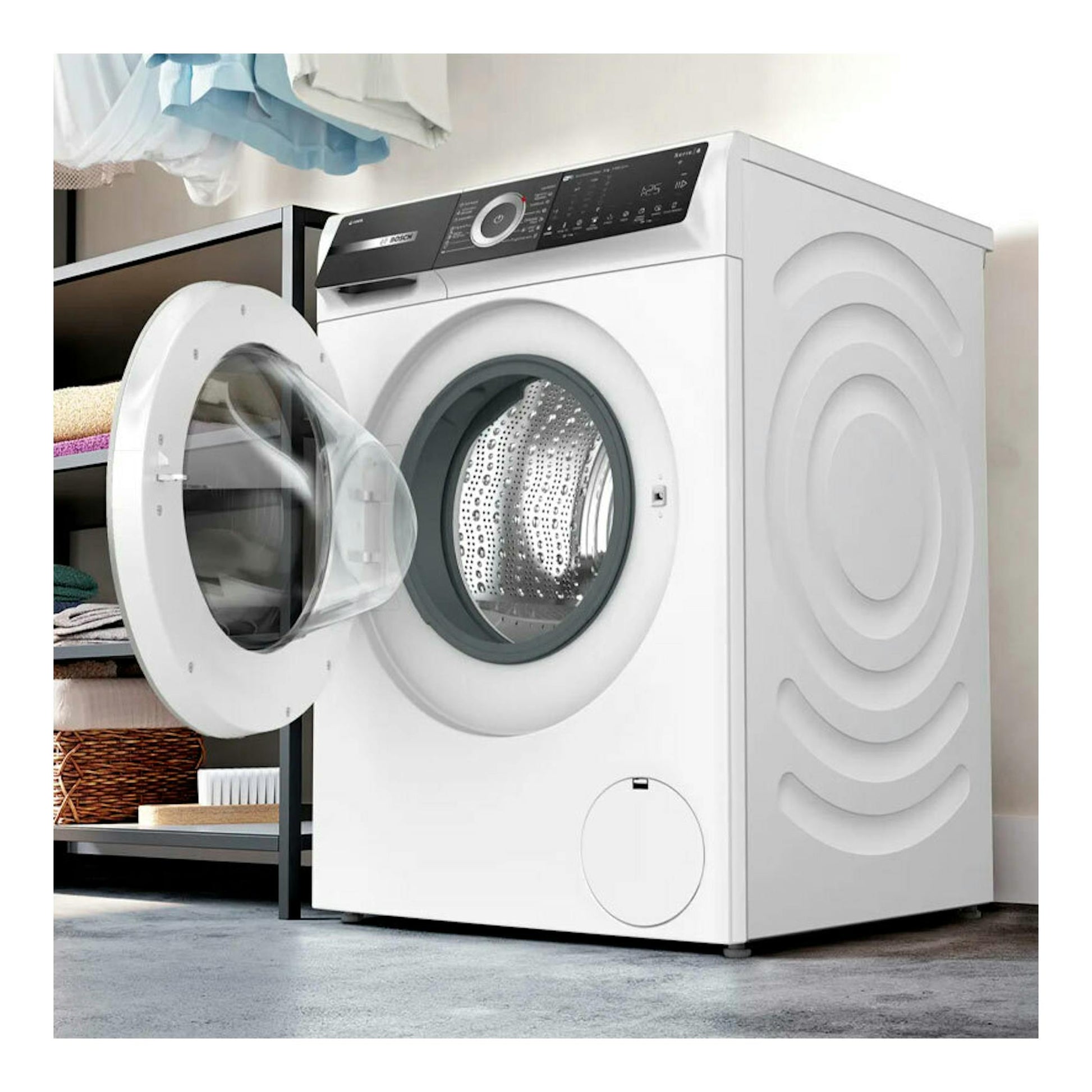 Lavadora Bosch WGH244A0ES blanca, de carga frontal, con puerta abierta y panel de control negro.