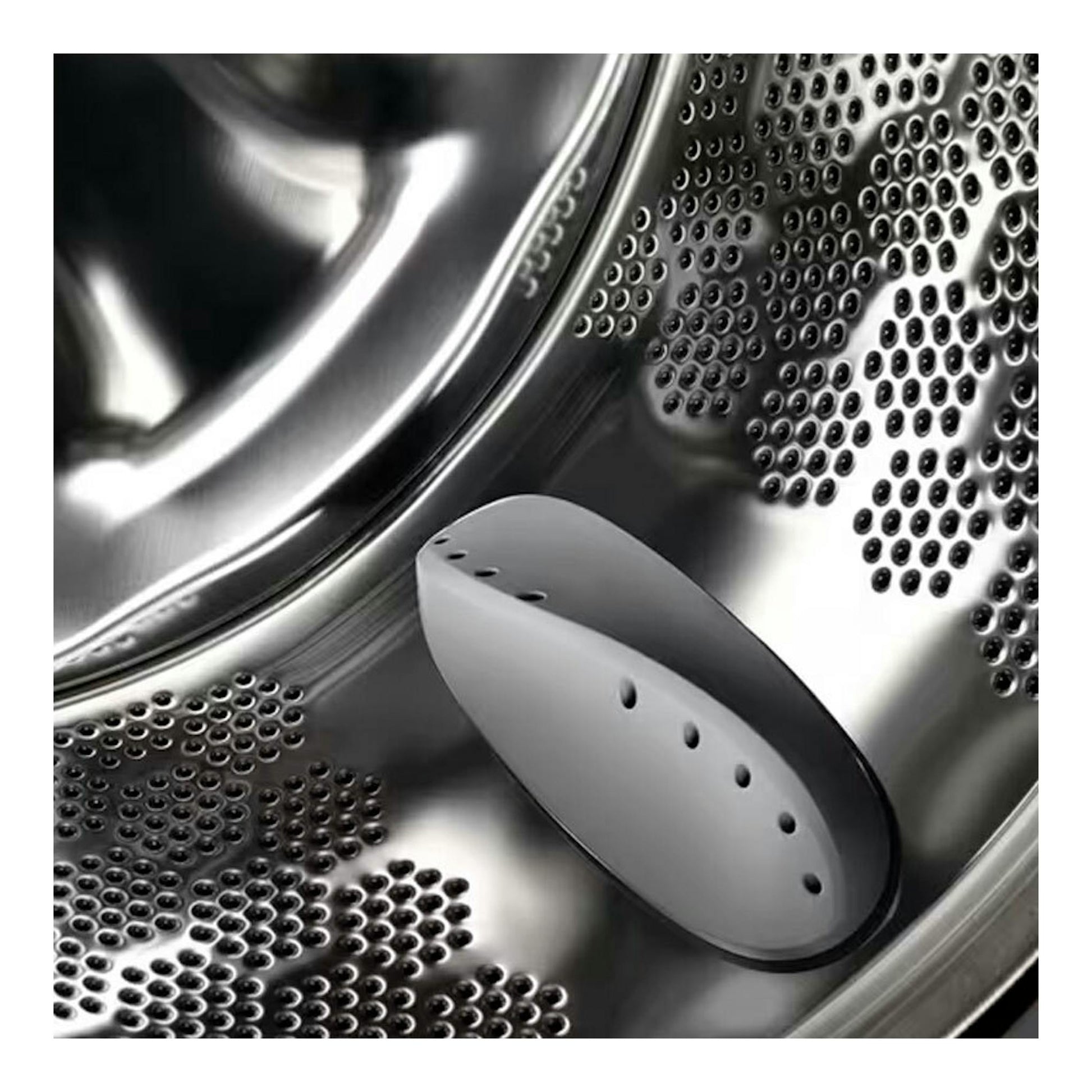 Interior del tambor de una lavadora Electrolux EA2F6821CF, en acero inoxidable, con pala gris en primer plano.