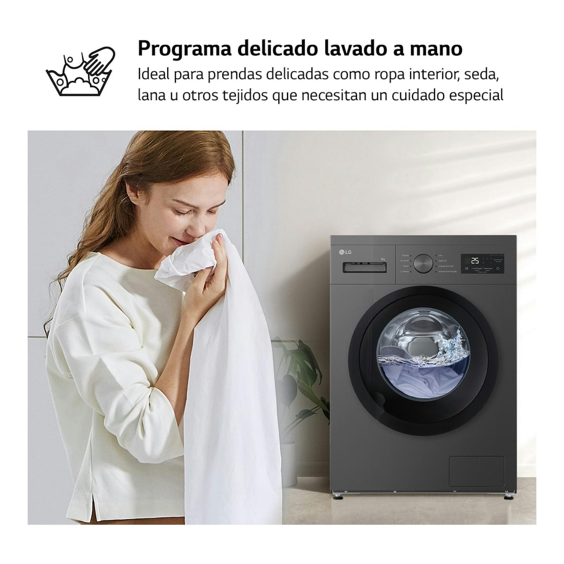 Lavadora LG F4A10S8NDK de carga frontal gris oscuro, junto a una mujer con una prenda blanca.