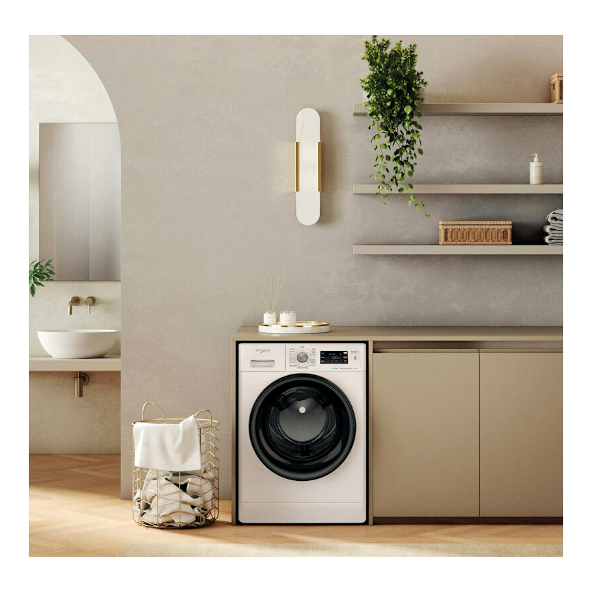 Lavadora frontal Whirlpool FFB11489BVSPT blanca de 11 kg, vista frontal, bajo encimera en baño/lavadero.
