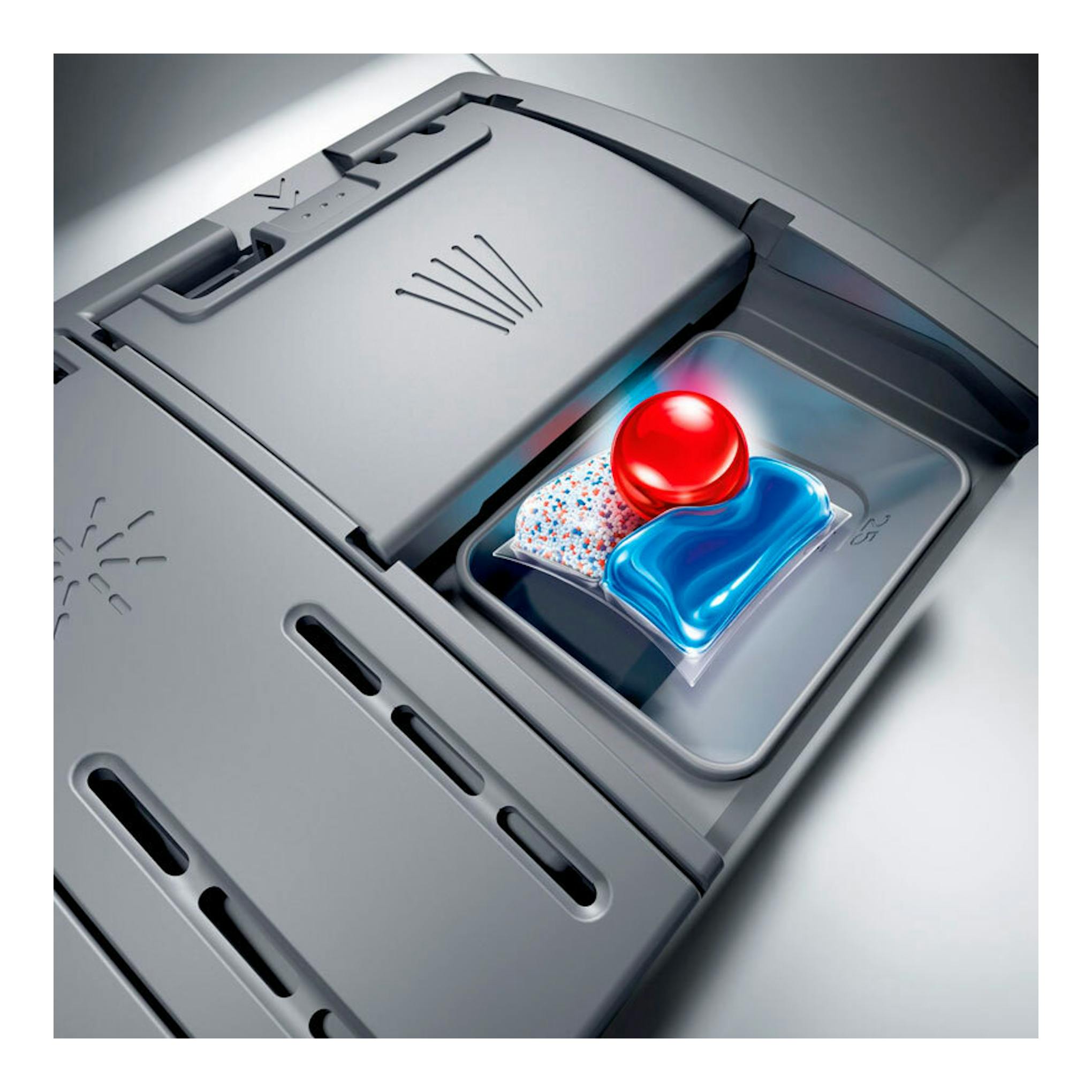 Bosch SMV4HVX14E: vista cenital del compartimento del lavavajillas con pastilla de detergente y gel azul.