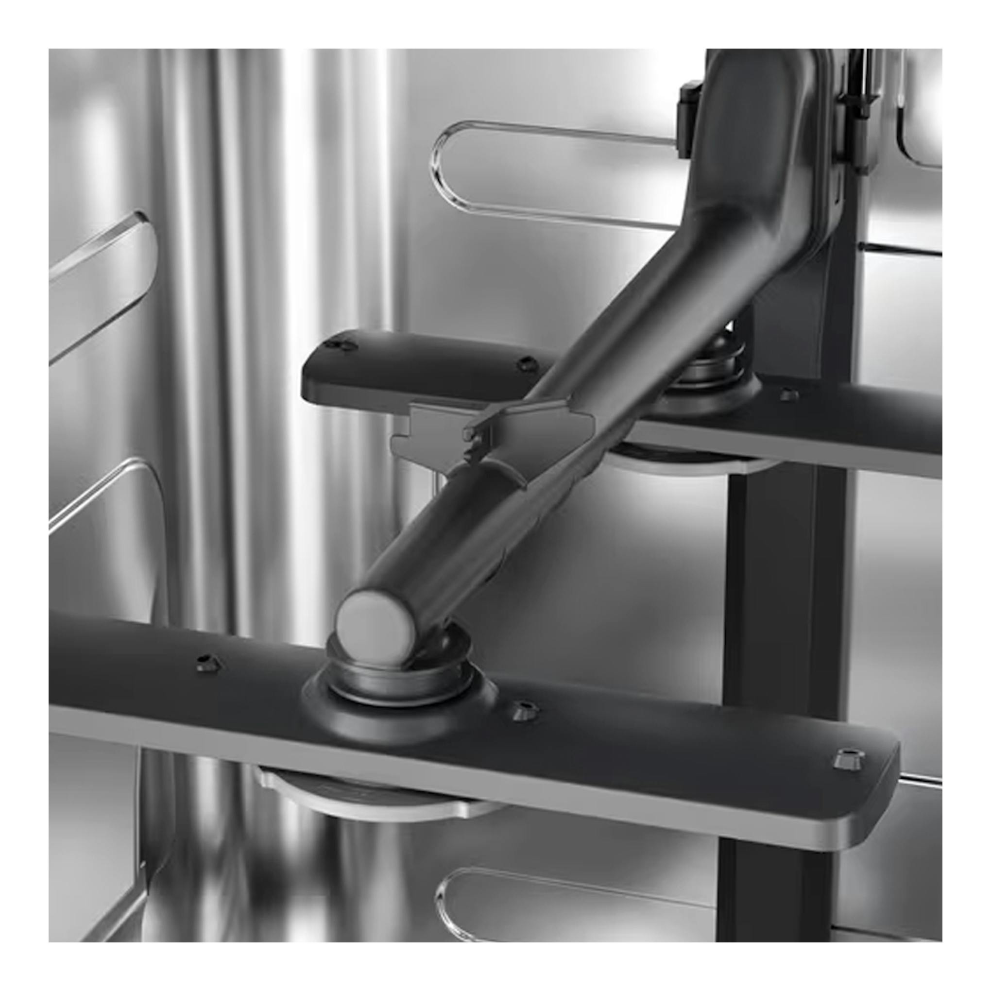 Lavavajillas integrable Electrolux EEG62310L, vista interior en acero inoxidable con brazo rociador negro.