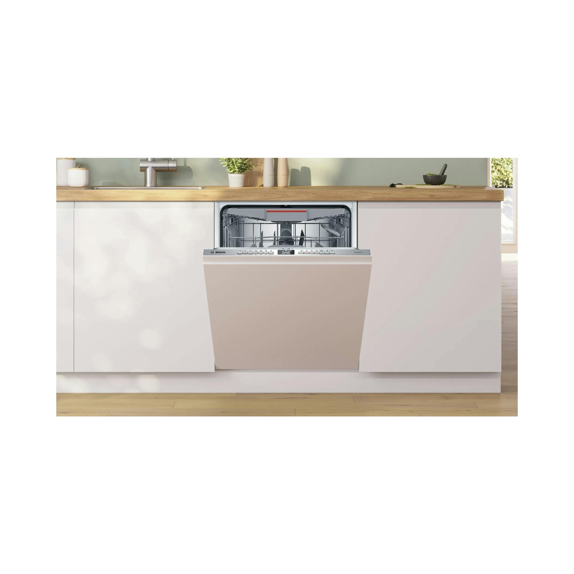 Lavavajillas integrable Bosch SBV6YCX02E, puerta abierta, panel frontal beige en cocina.