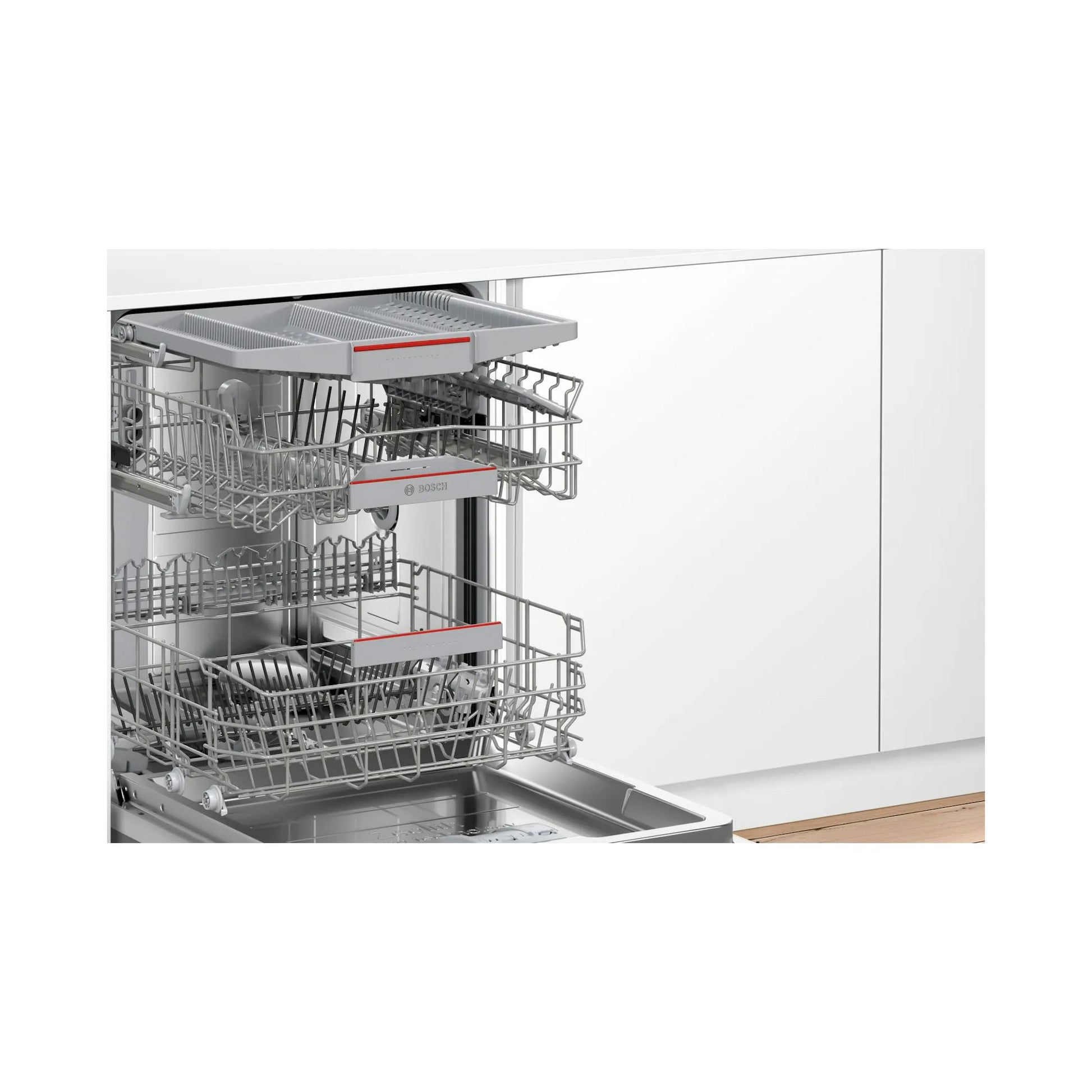 Lavavajillas Bosch SBV6YCX02E totalmente integrable, abierto, con cestas grises en cocina blanca.