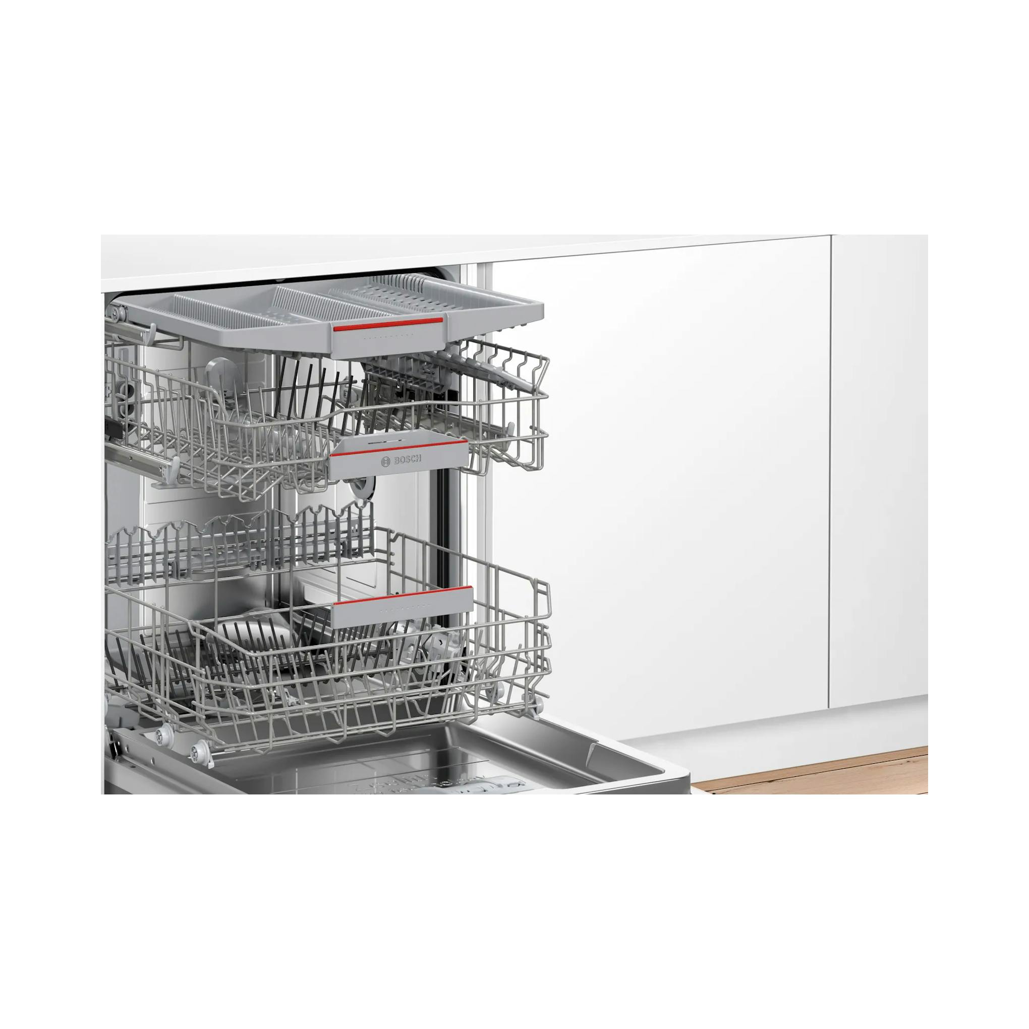 Lavavajillas Bosch SBV6YCX02E totalmente integrable, abierto, con cestas grises en cocina blanca.