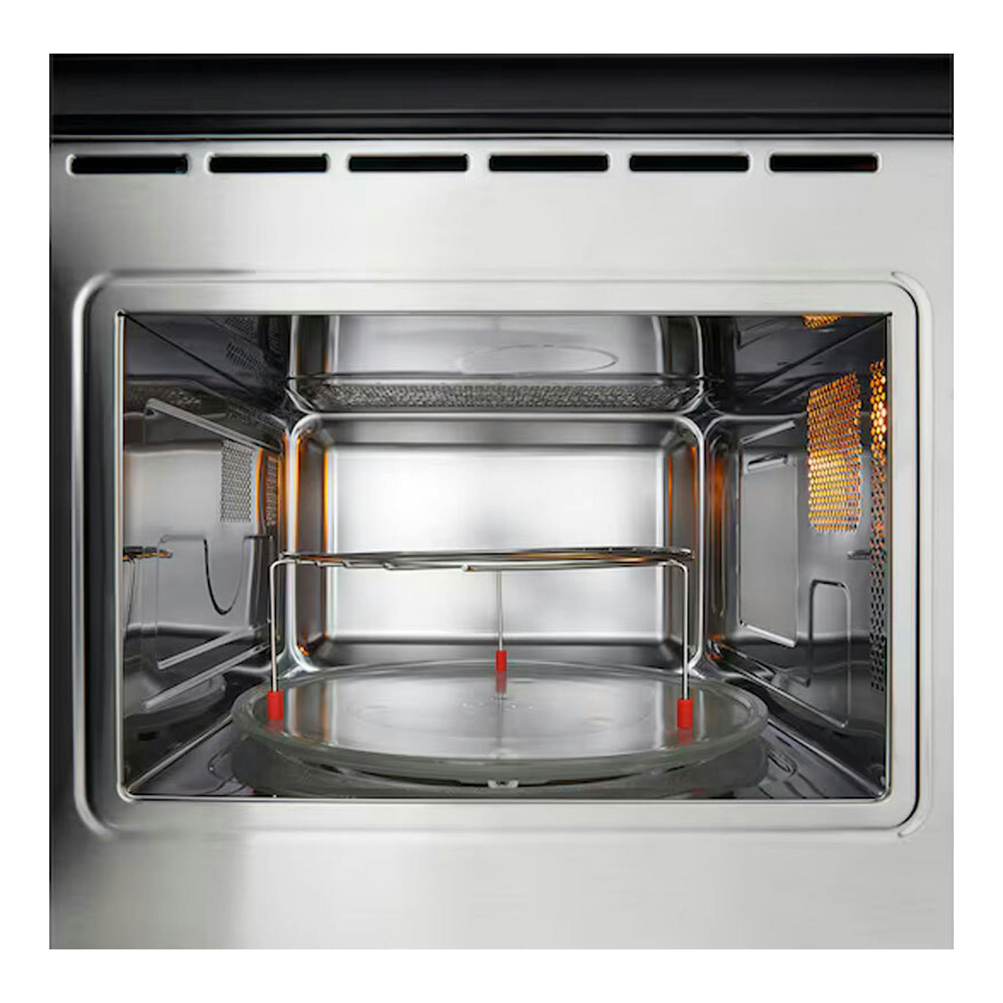 Microondas integrable LG MG7Z2593B de cristal negro, vista frontal del interior con plato giratorio.