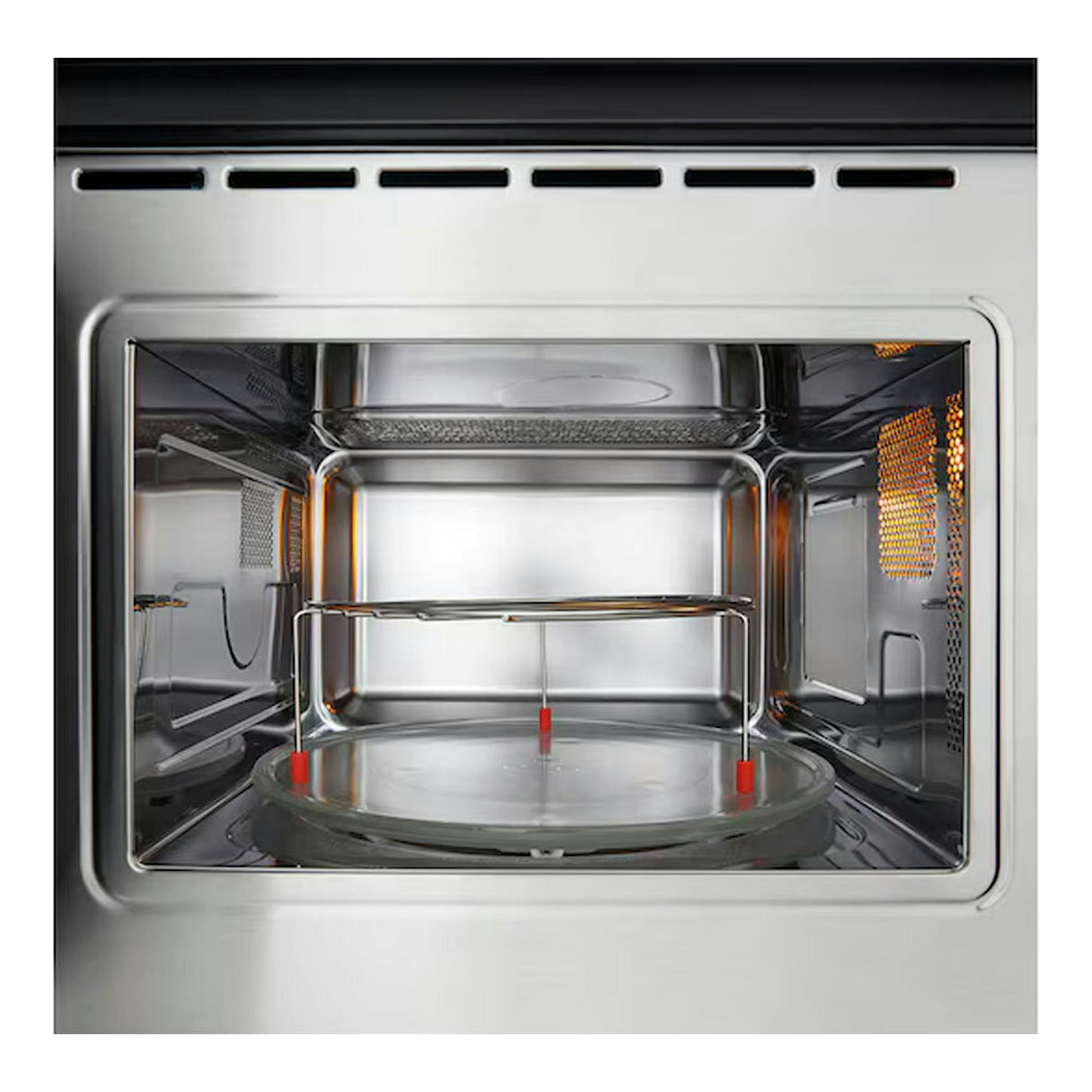Microondas integrable LG MG7Z2593D inox, vista frontal del interior en acero inoxidable con plato giratorio.