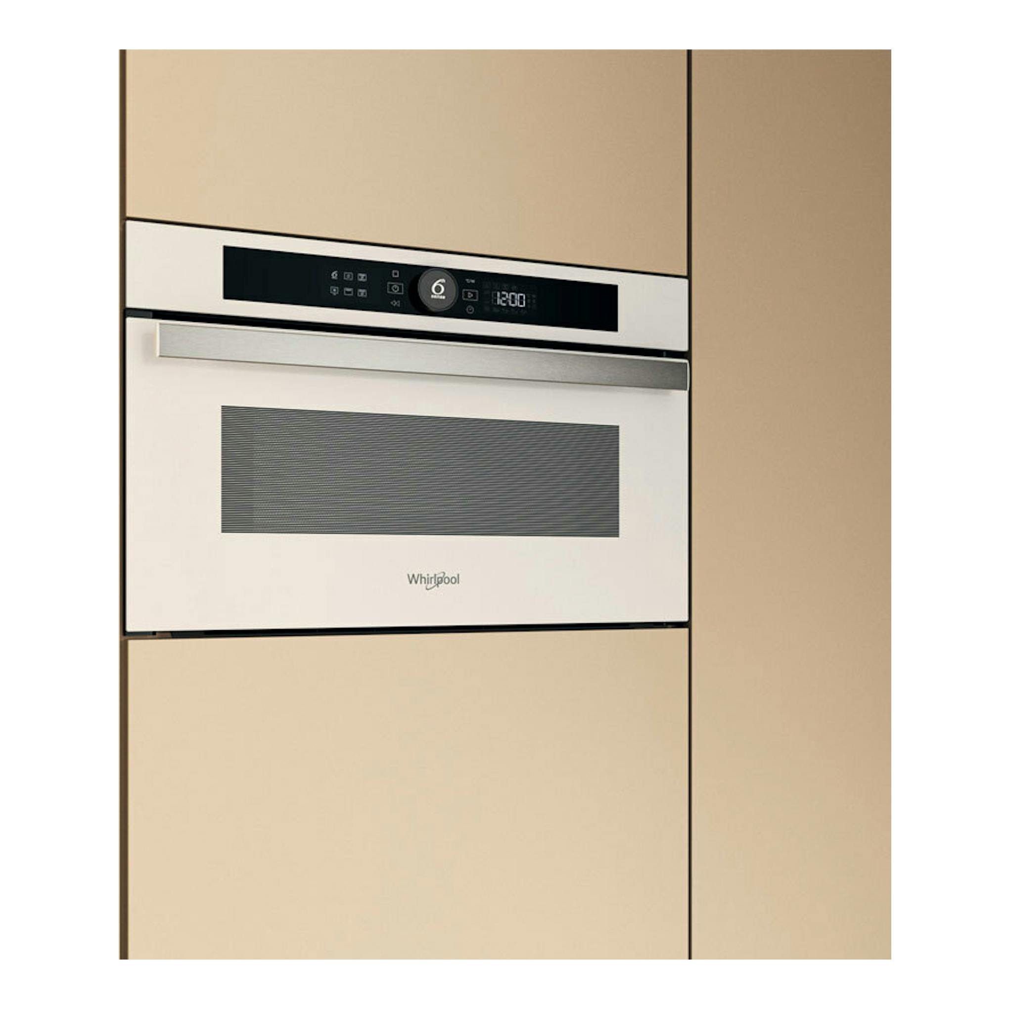 Microondas integrable Whirlpool WMD44MW, vista frontal, puerta blanca y panel negro, en mueble beige.