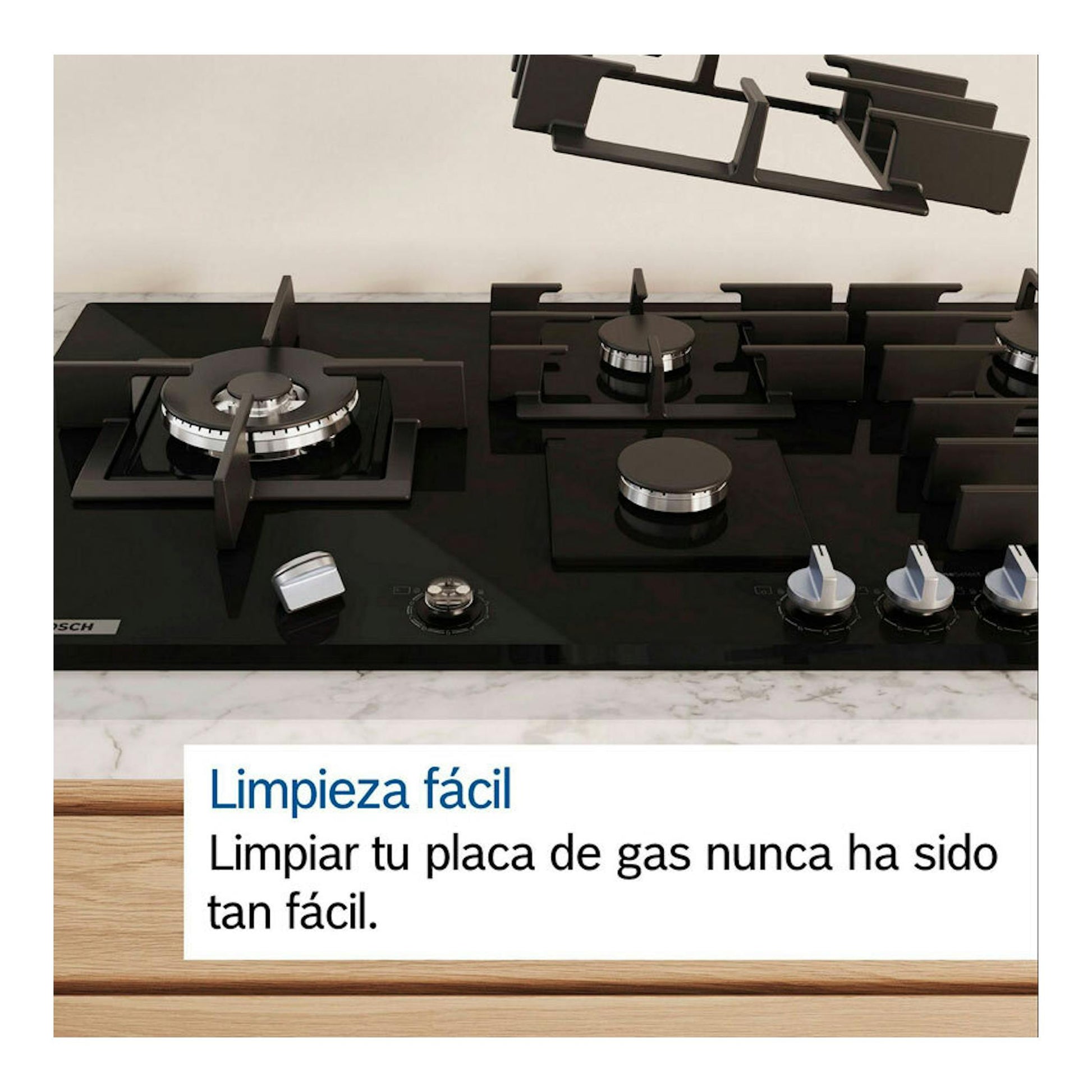 Placa de gas Bosch PRB3A6I40 de cristal negro, vista frontal, con varios quemadores y mandos.