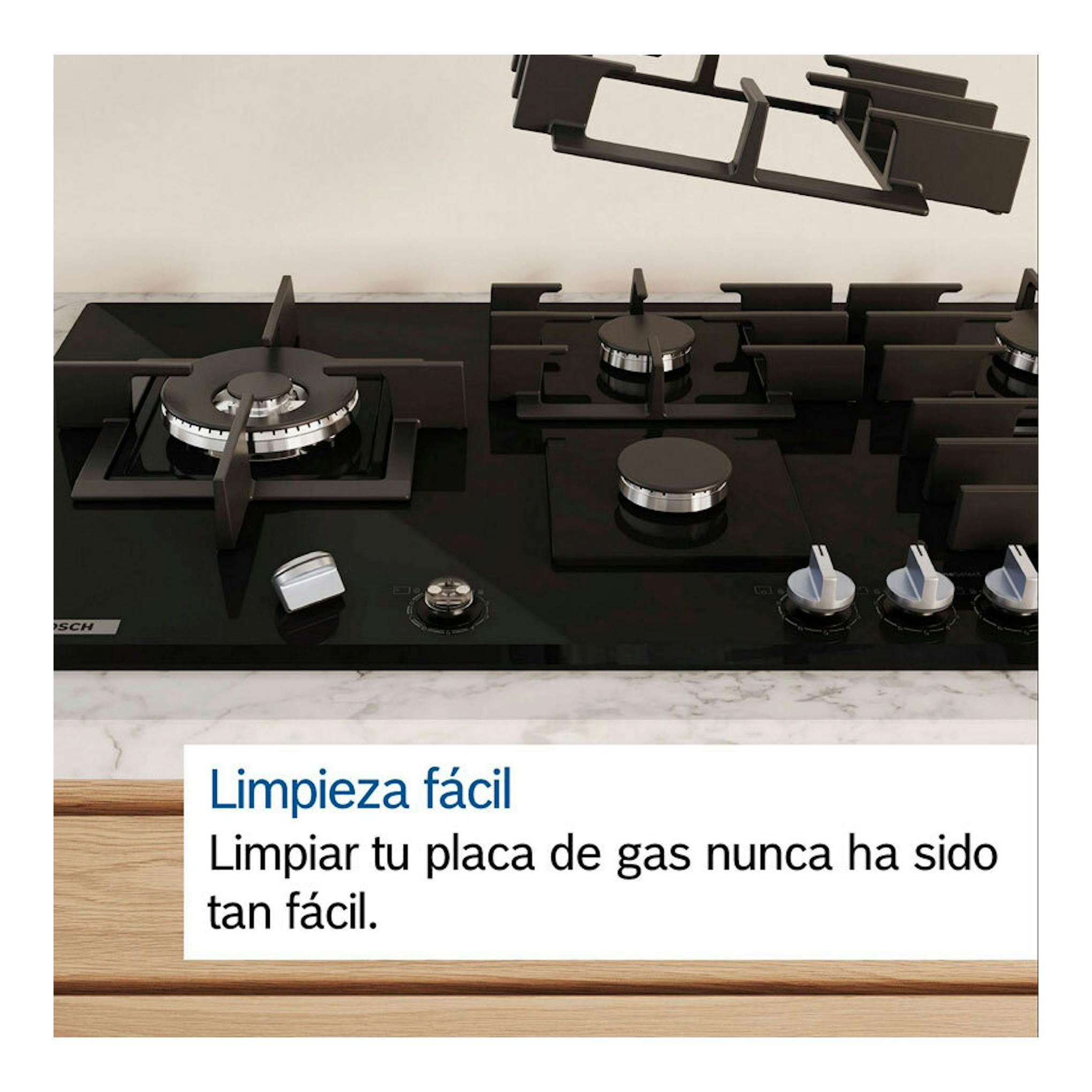 Placa de gas Bosch PRB3A6I40 de cristal negro, vista frontal, con varios quemadores y mandos.