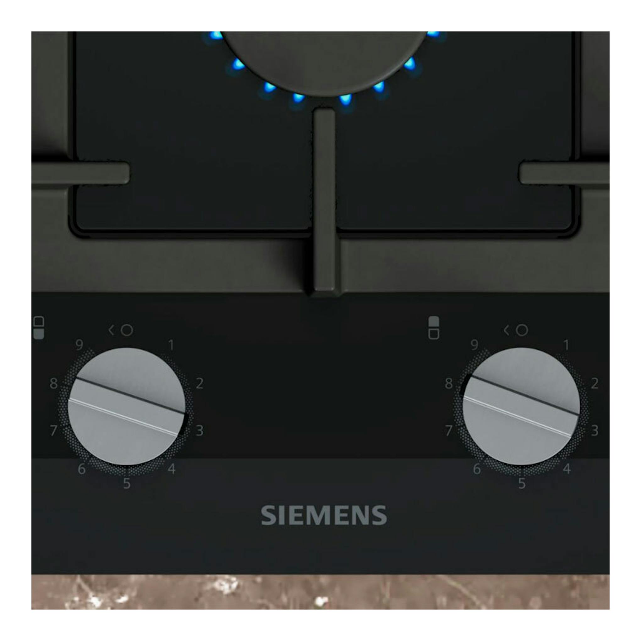 Placa de gas Siemens ER3A6BI40 negra de 30 cm, vista frontal, con dos mandos plateados.