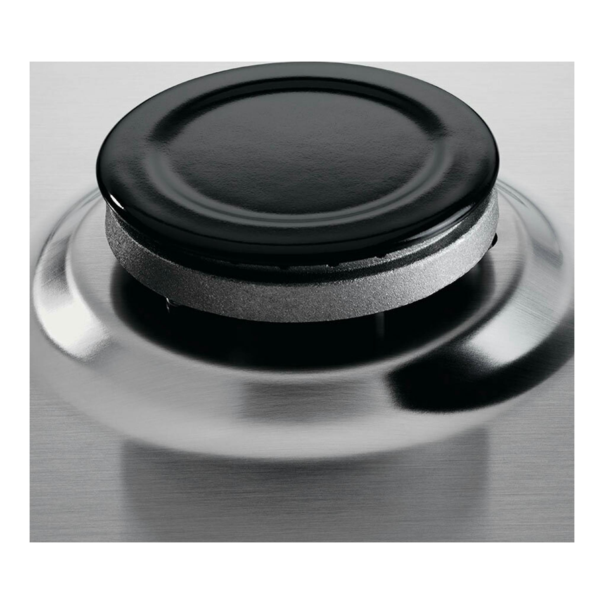Electrolux KGS6404SX: primer plano de un quemador de placa de gas en acero inoxidable, vista cenital.