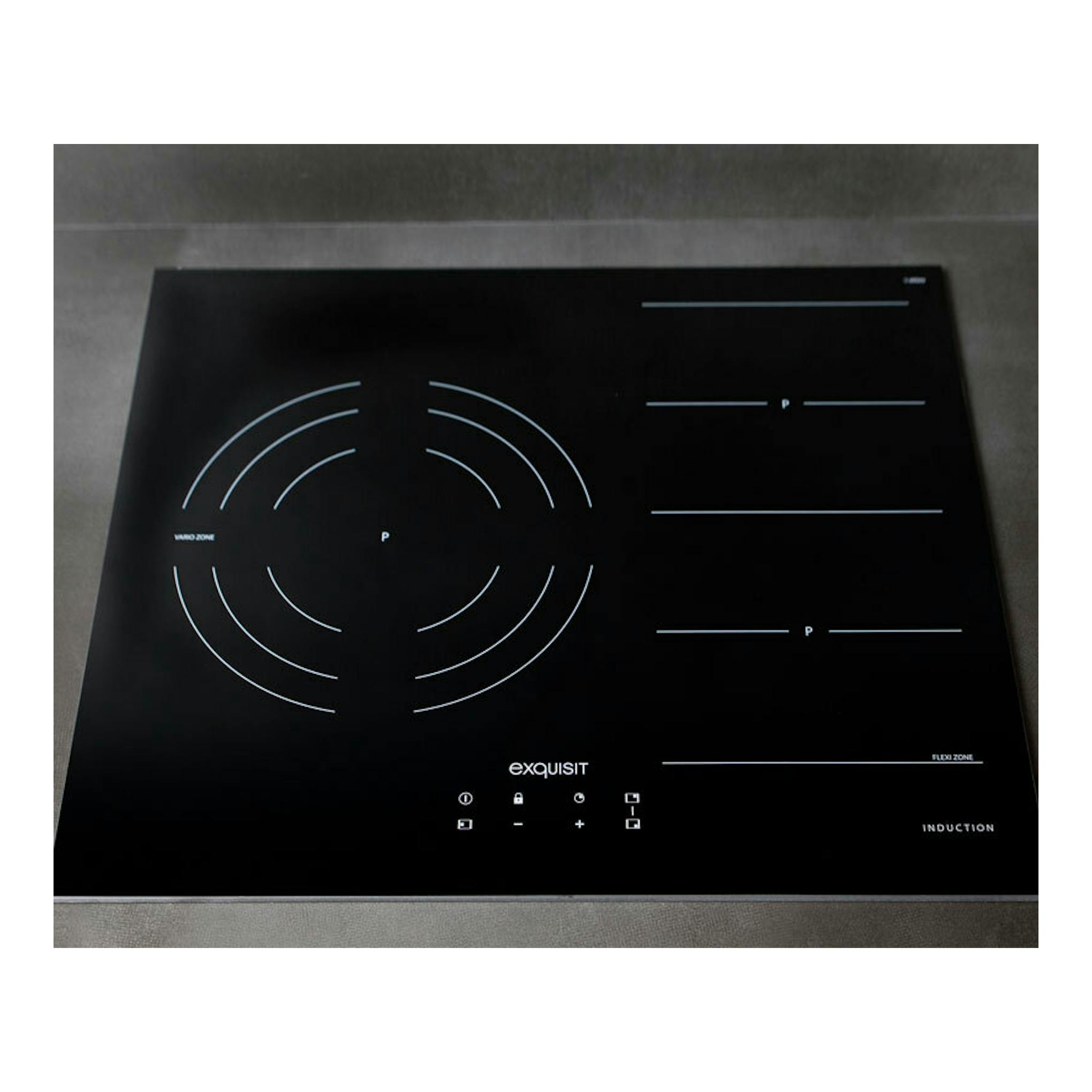 Placa de inducción Exquisit EKI 653F negra, vista frontal, con zonas de cocción circulares y líneas táctiles.