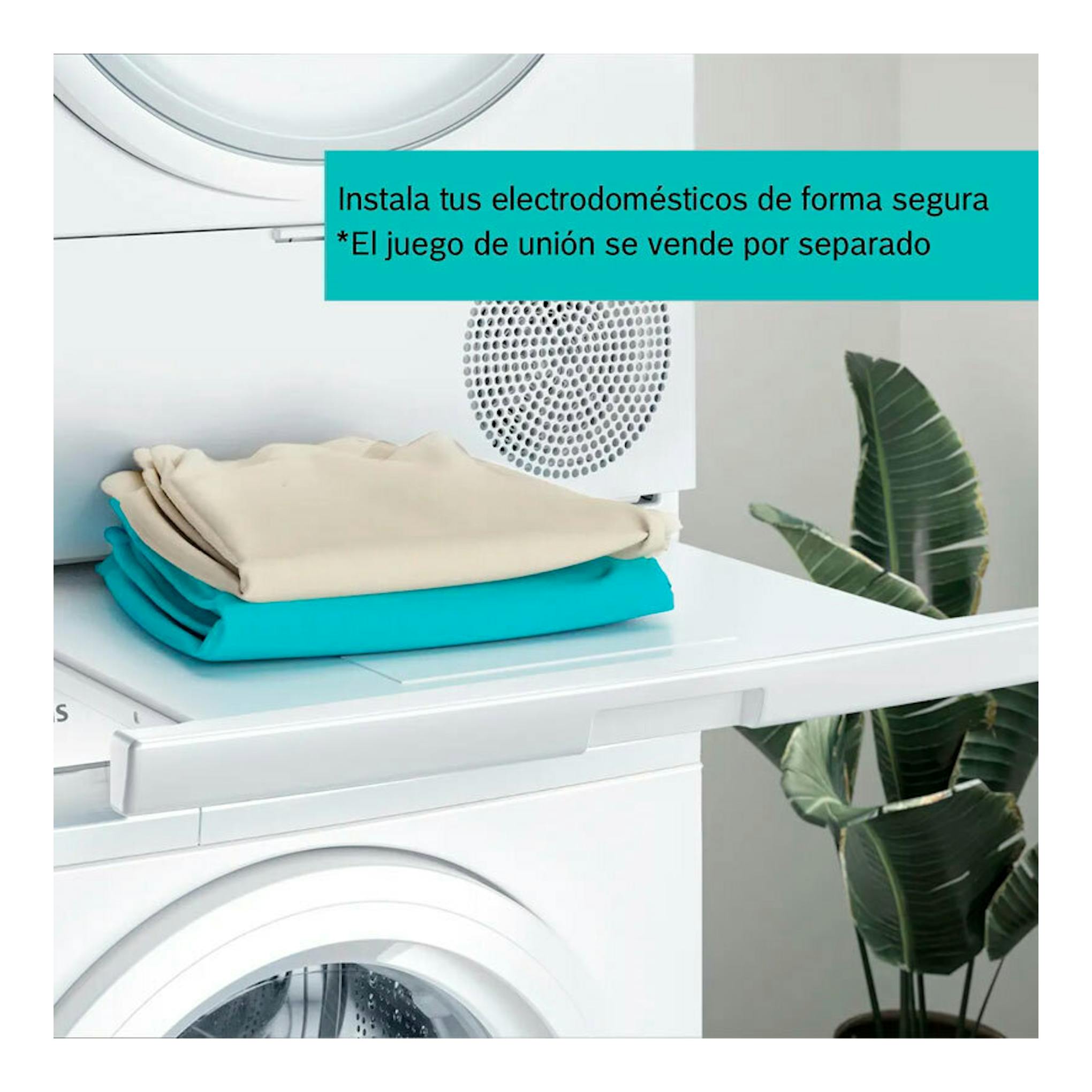 Secadora Siemens WQ45G2D0ES blanca, vista frontal parcial, con ropa doblada encima sobre una lavadora.