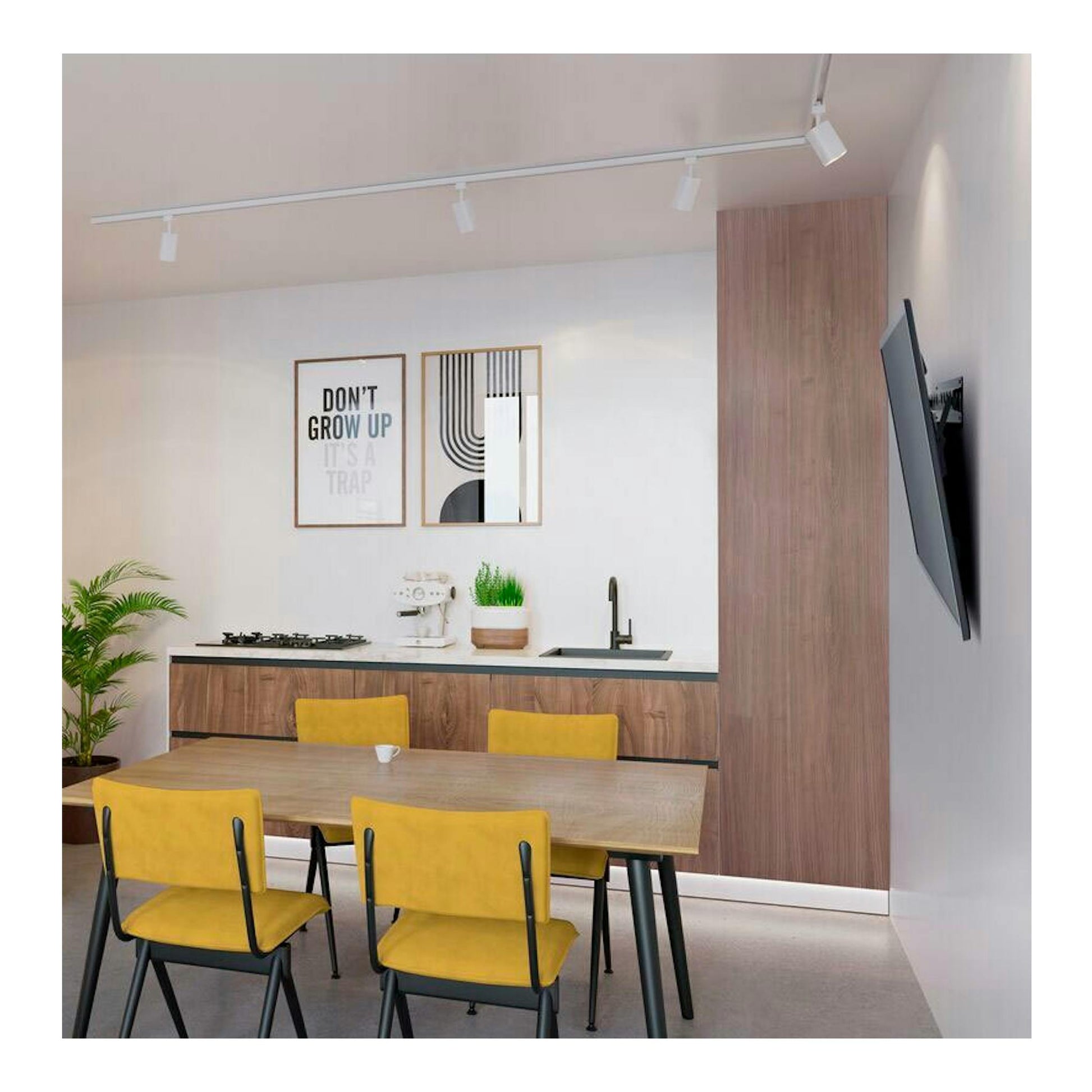 Soporte TV Vogels MA2010 con televisor, vista lateral en pared blanca de cocina-comedor moderna.