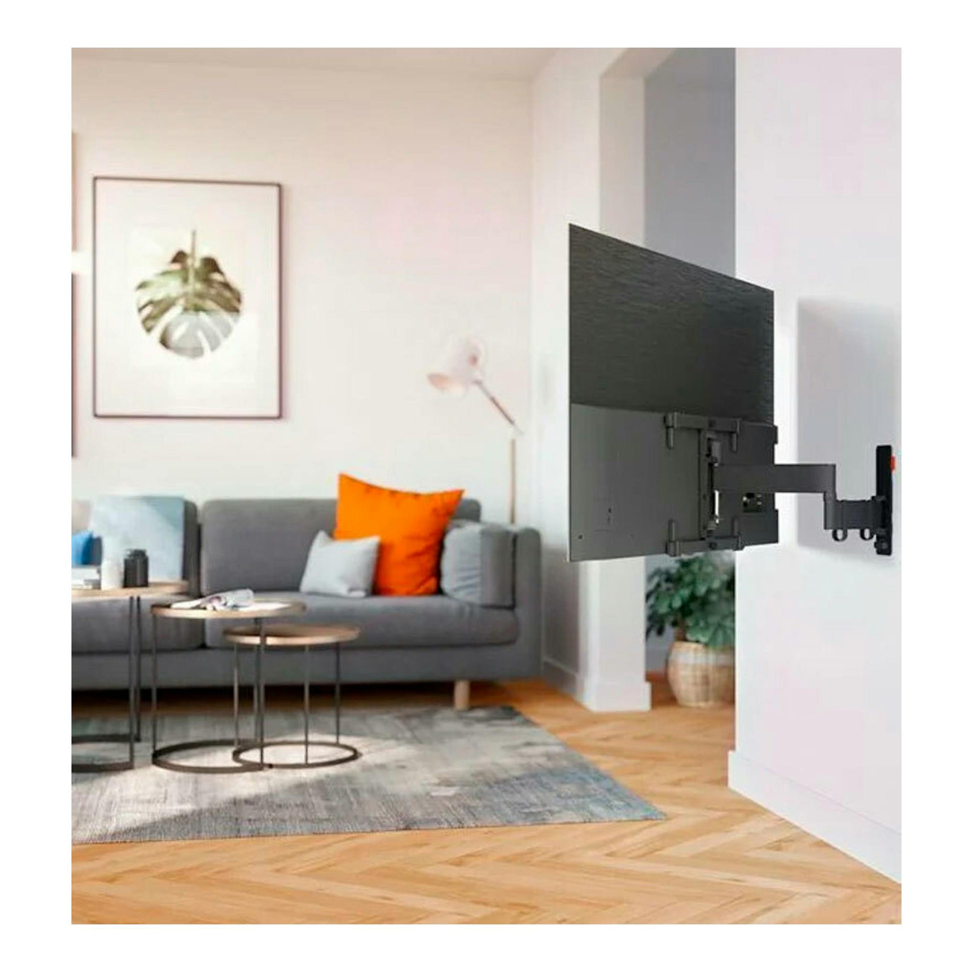 Soporte TV Vogel's TVM 3463 negro, con brazo articulado, fijado a pared, con televisor en vista lateral.