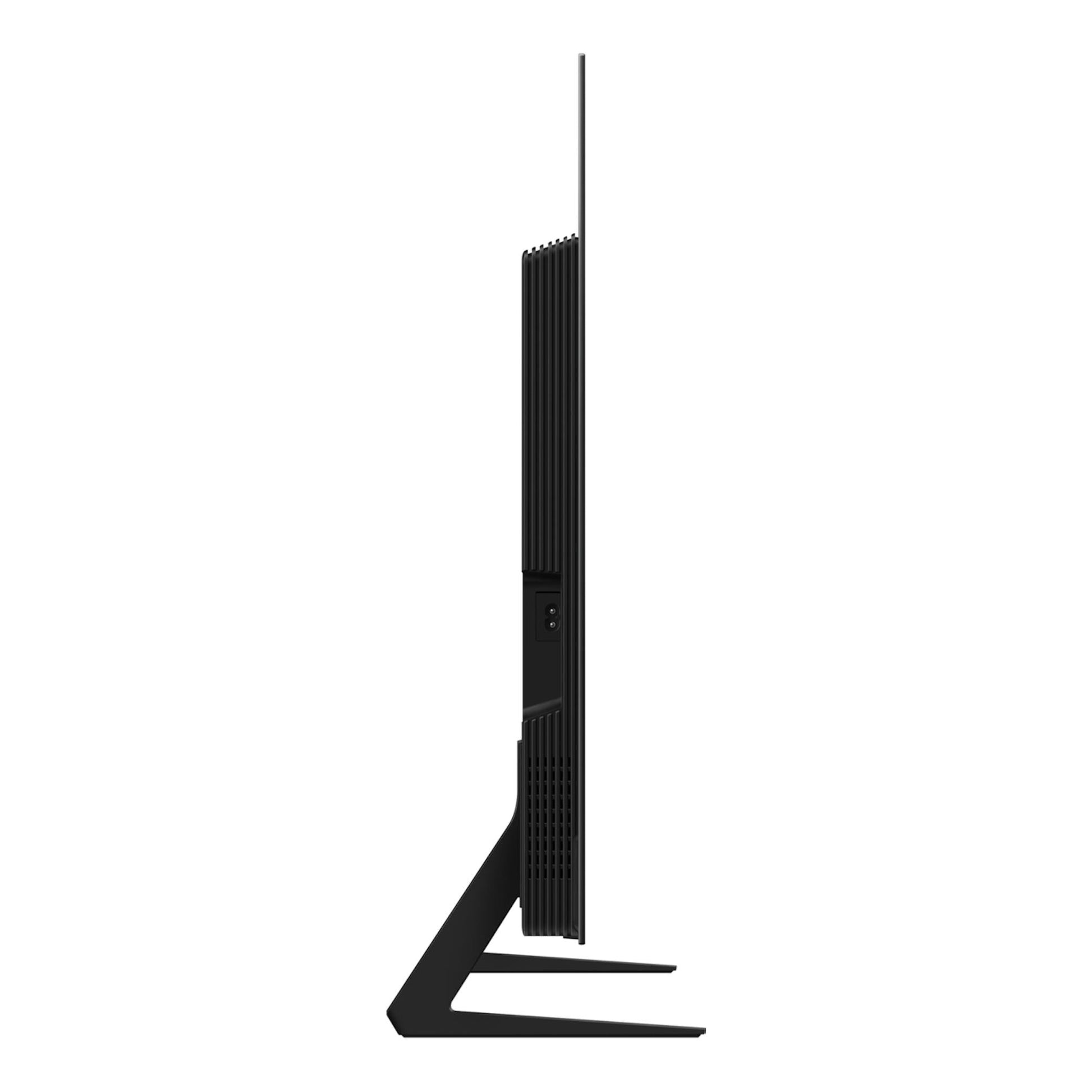 Televisor Samsung TQ55S90FAEXXC negro, vista lateral, con soporte de pie, perfil delgado.