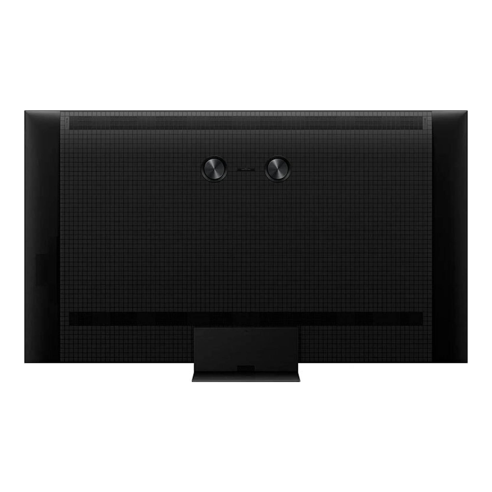 Vista trasera de un televisor TCL 65C7K MiniLED 4K de 65", negro, con peana central.
